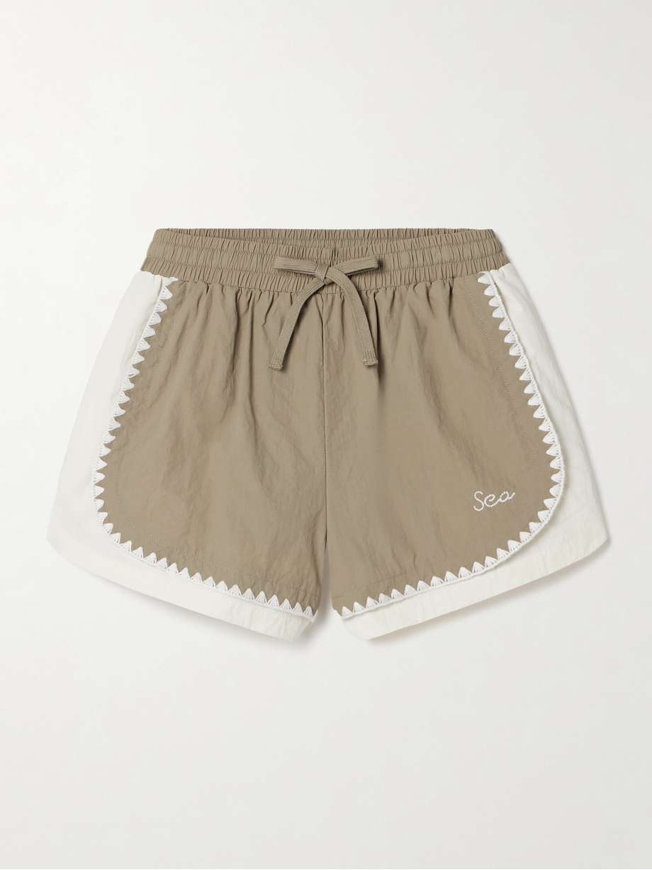 Sea's 'Asta' shorts are traced with intricate crochet along the edges, giving the sporty style a more feminine feel. They're made from crinkled-shell and have an elasticated drawstring waistband and label's logo above the hem.