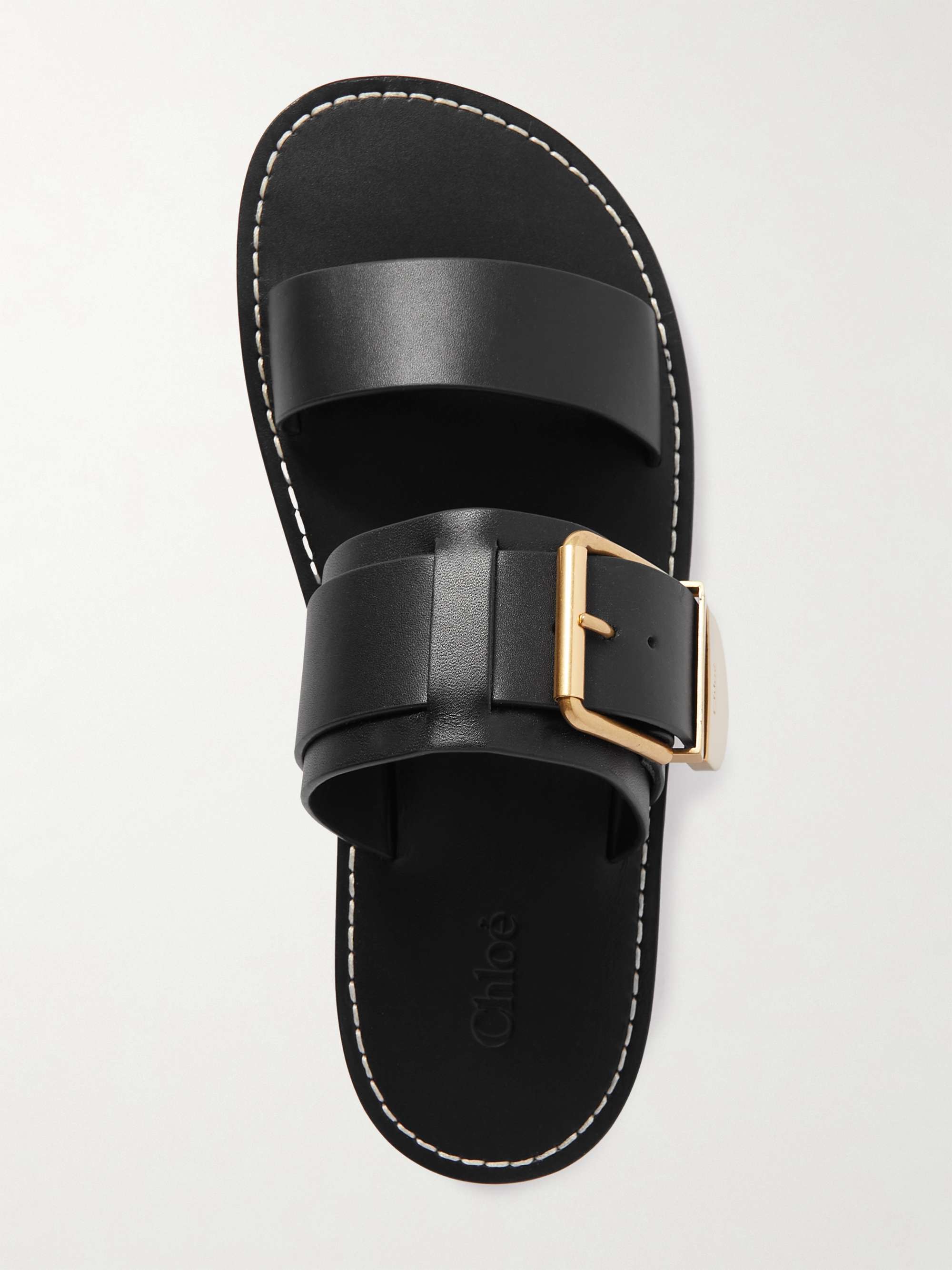 Black leather sales slip on sandals