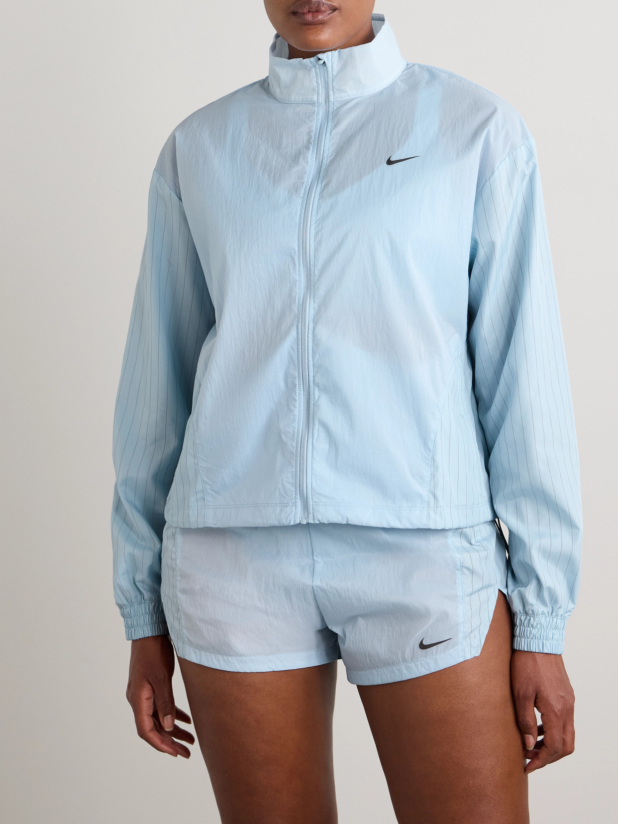 Nike Running Division Paneled Pinstriped Crinkled-shell Jacket In Blue