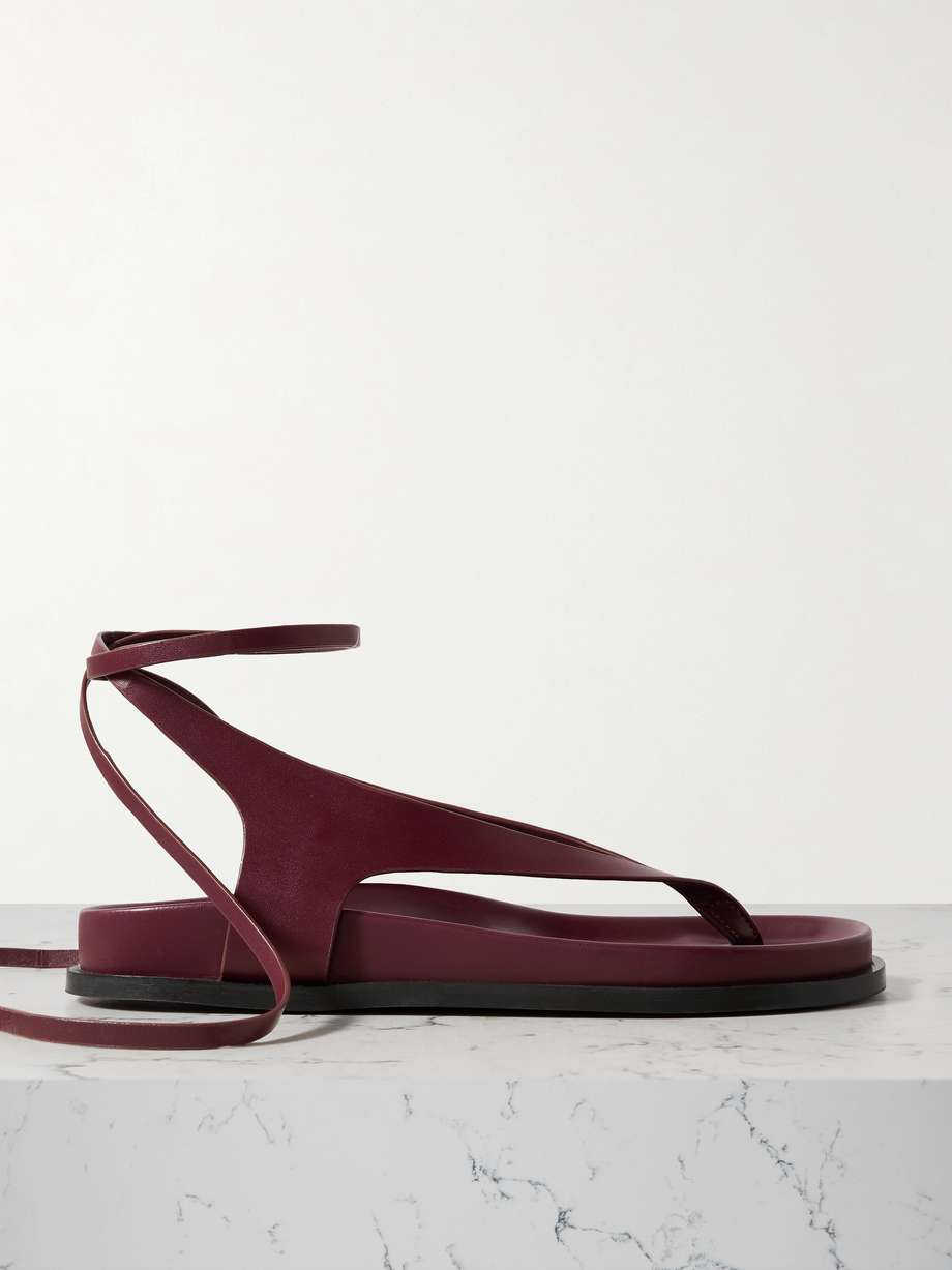 A.EMERY's 'Shel' sandals are a timeless choice for every summer wardrobe. They're made from smooth leather with a rounded toe and generous wraparound straps that tie at the ankle. Wear yours with a floaty dress or wide-leg pants.