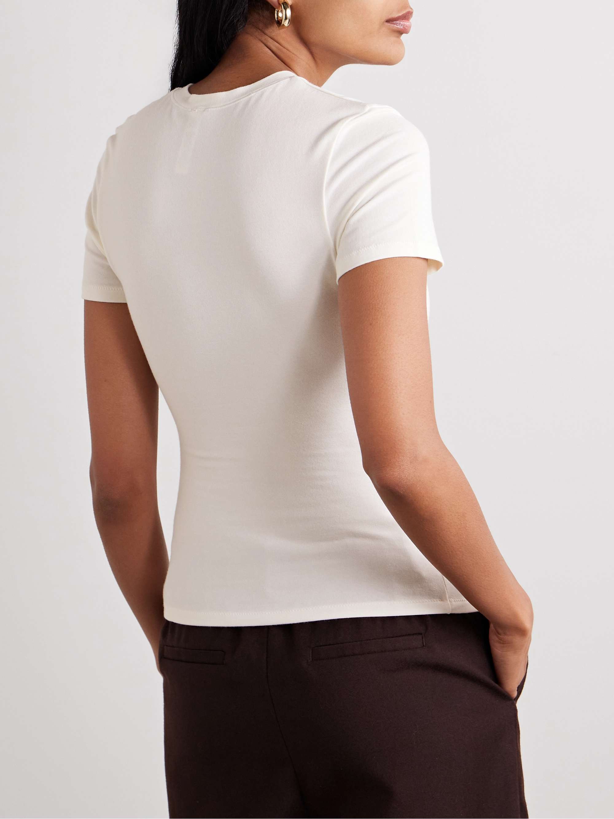 SKIMS تي شيرت من قطن الجيرسي المطاط - بلون Light Heather Gray