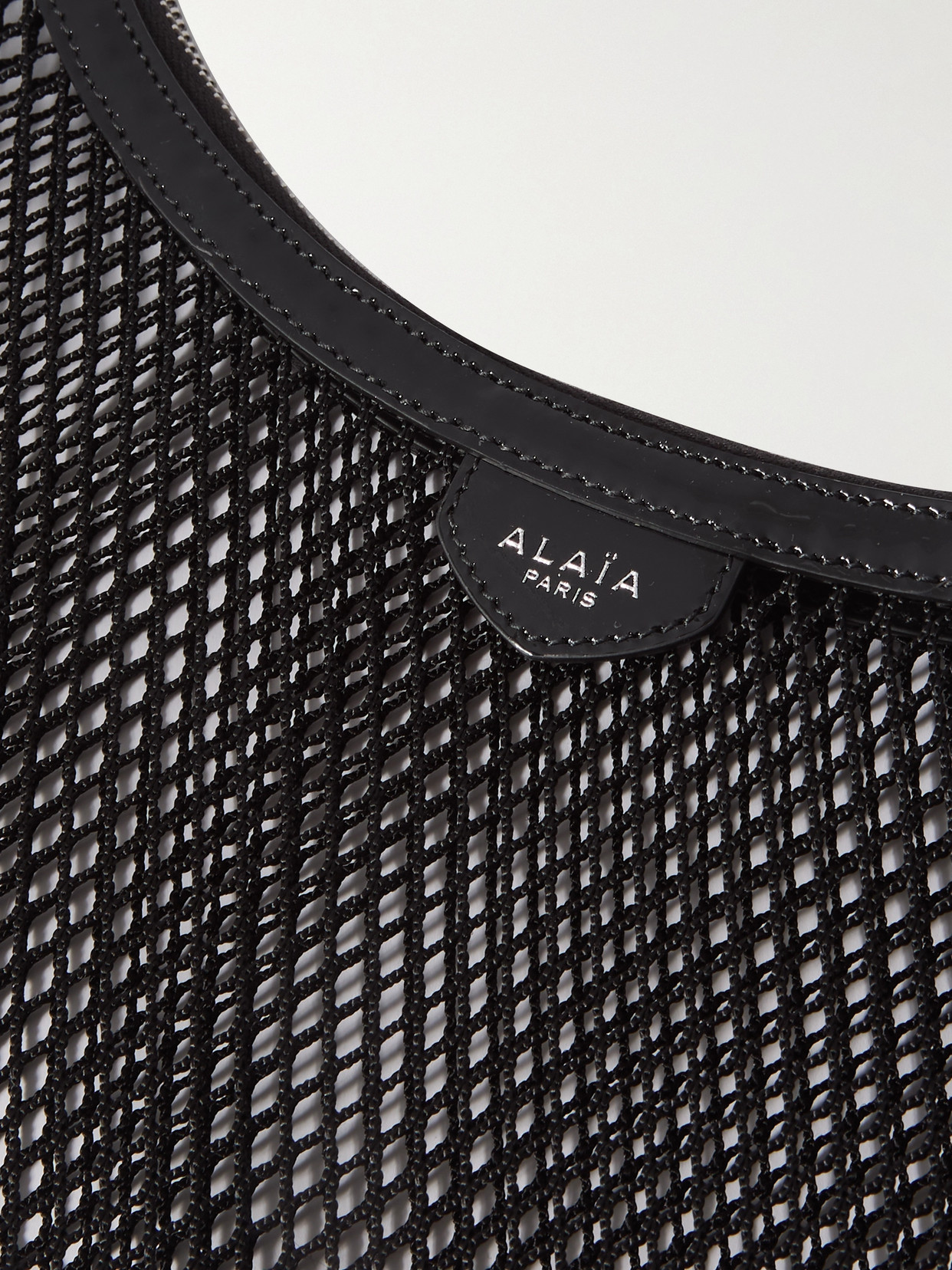 Alaïa One Piece Demi-lune Mesh Shoulder Bag In Black