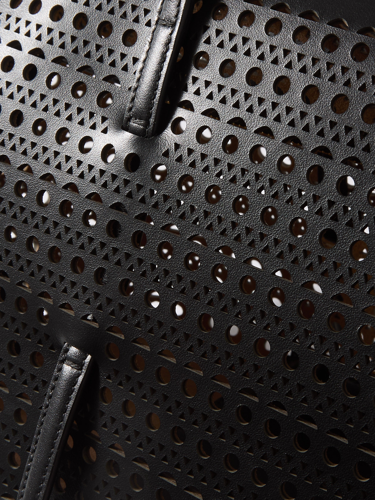Alaïa Neo Mina 20 Perforated Top-handle Bag In Leather In Black
