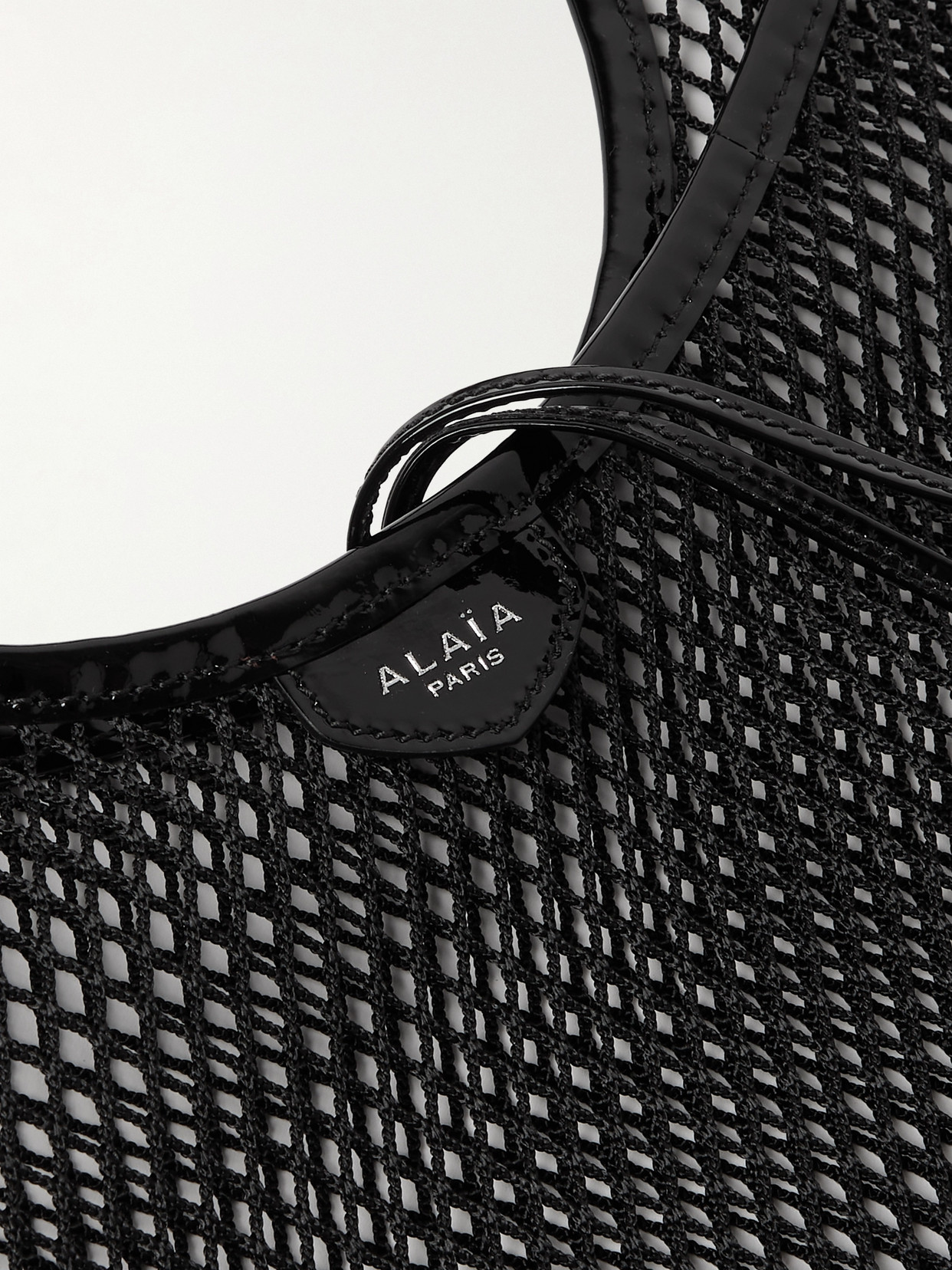 Alaïa Patent-leather Trimmed Mesh Shoulder Bag In Black
