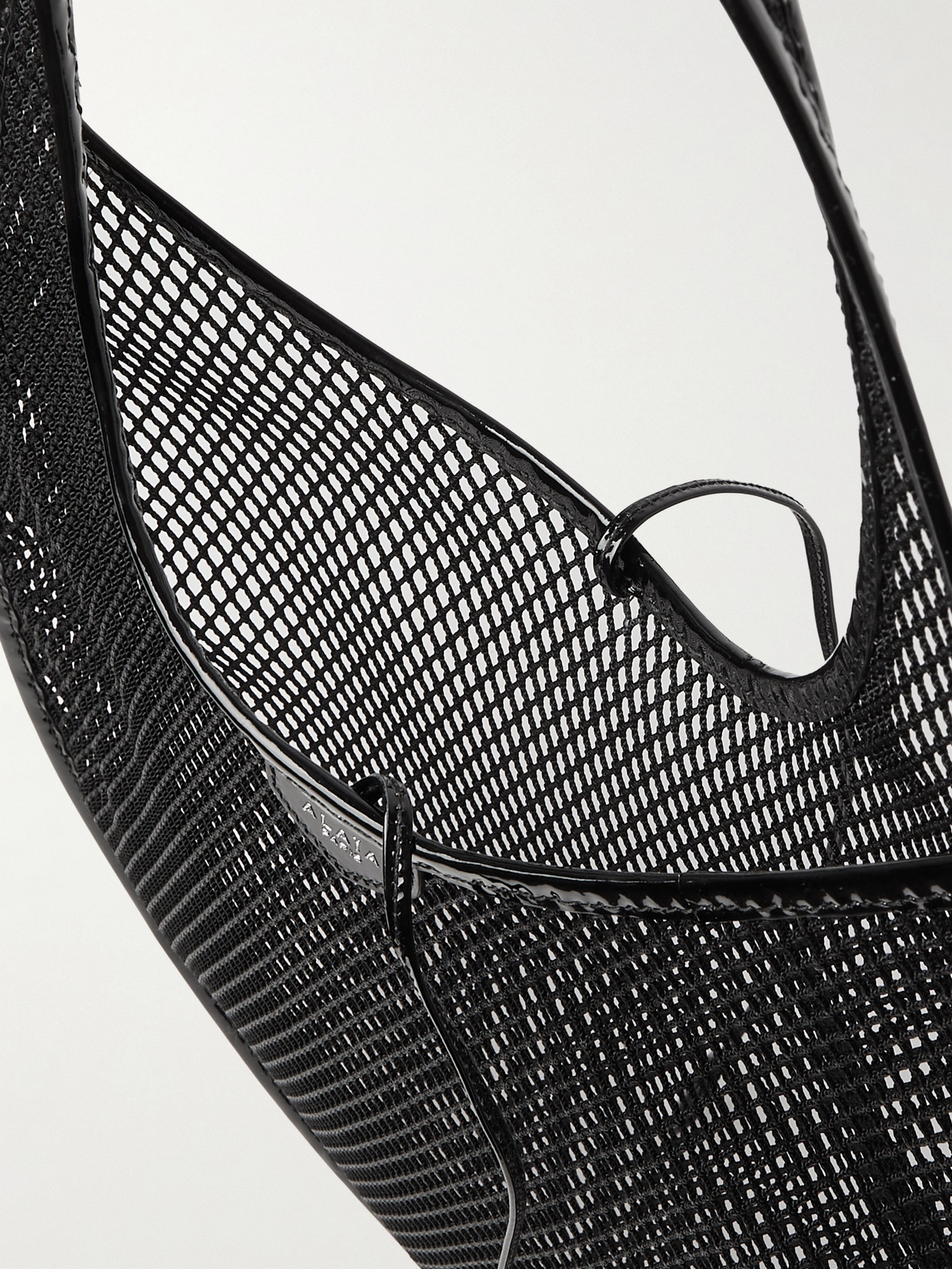 Alaïa Patent-leather Trimmed Mesh Shoulder Bag In Black
