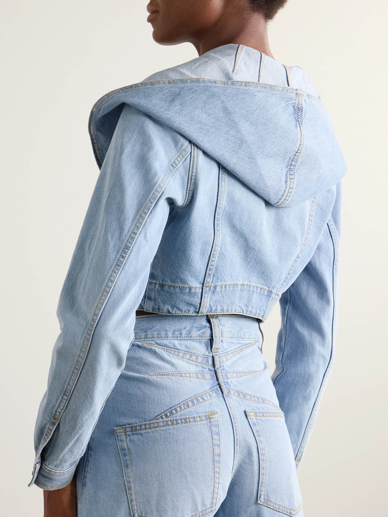 Alaïa Hooded Denim Jacket With Cinched Waist In Blue