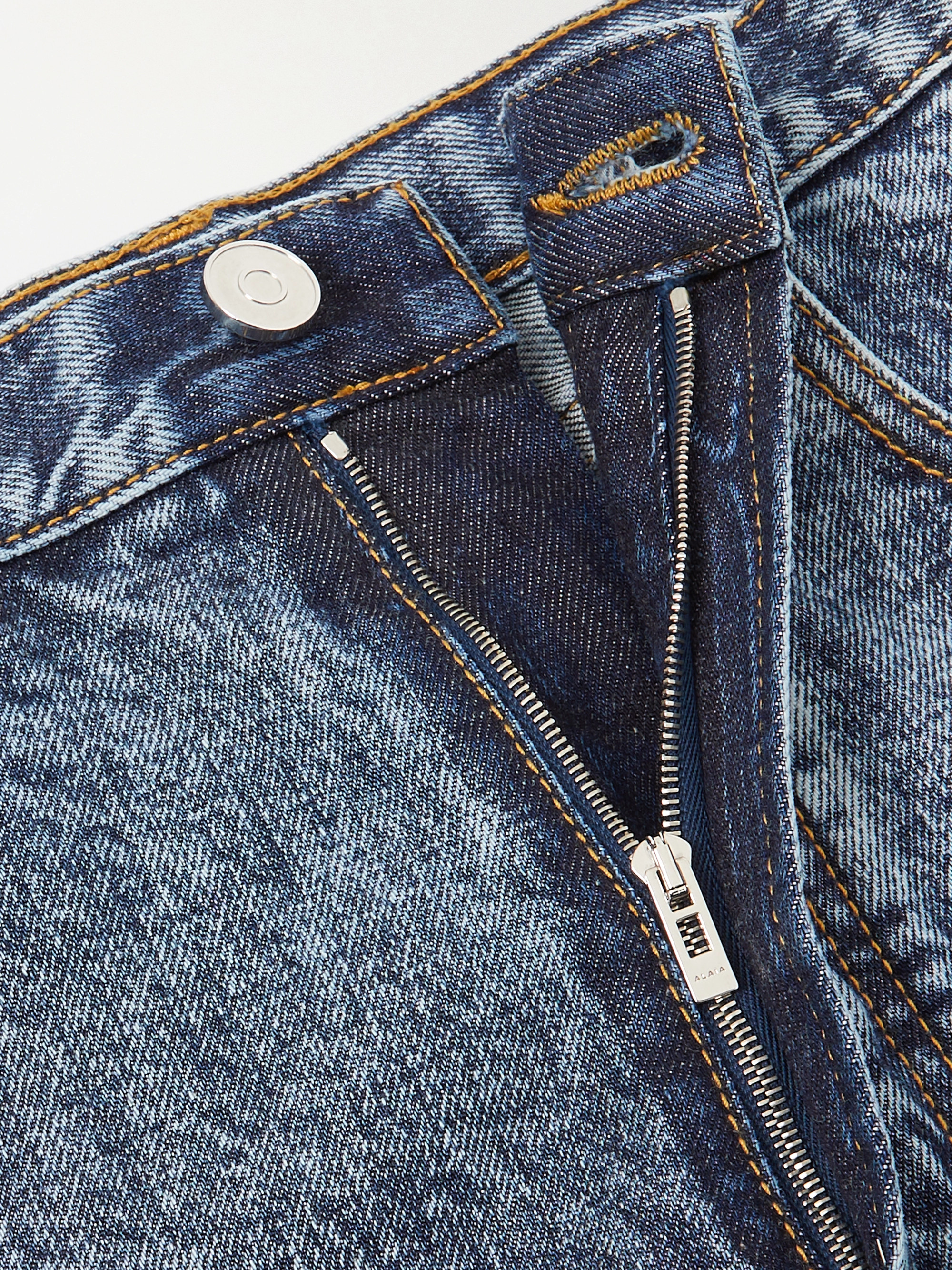 Alaïa Acid-wash high-rise barrel-leg jeans thumbnail