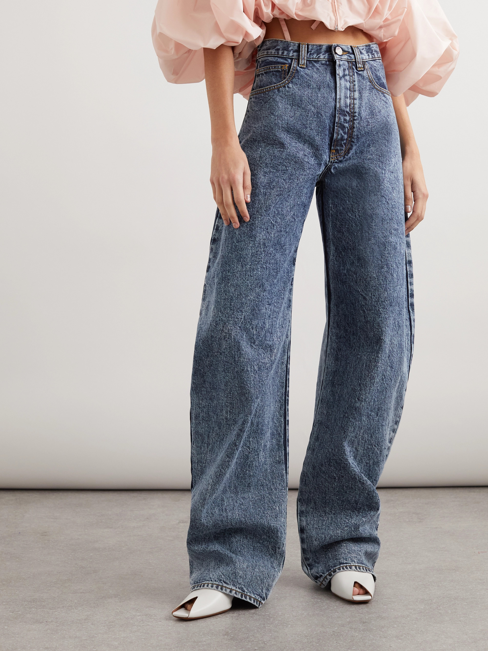 Alaïa Acid-wash high-rise barrel-leg jeans