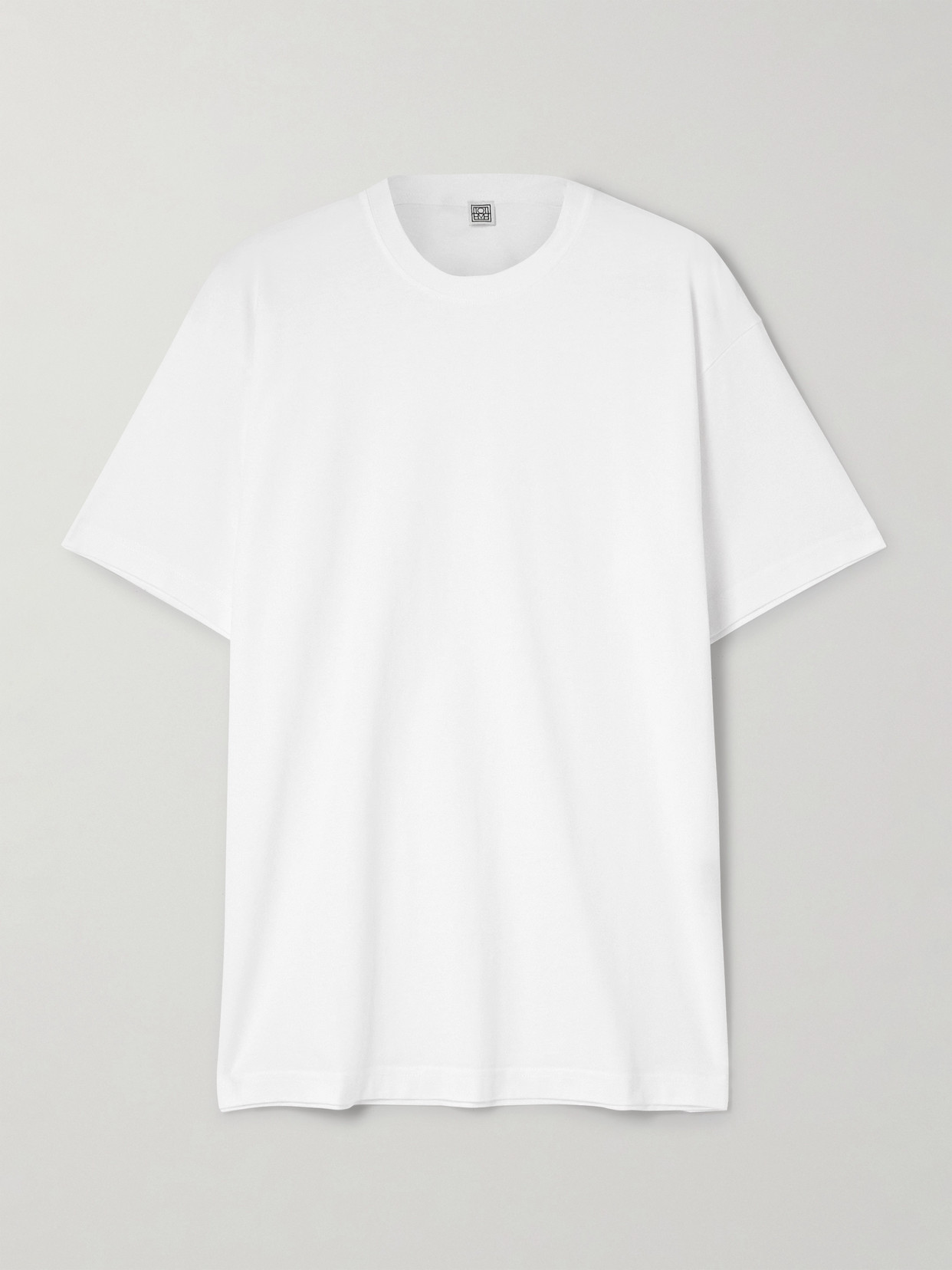 Totême Toteme Monogram Embroidered Curved T Shirt In White