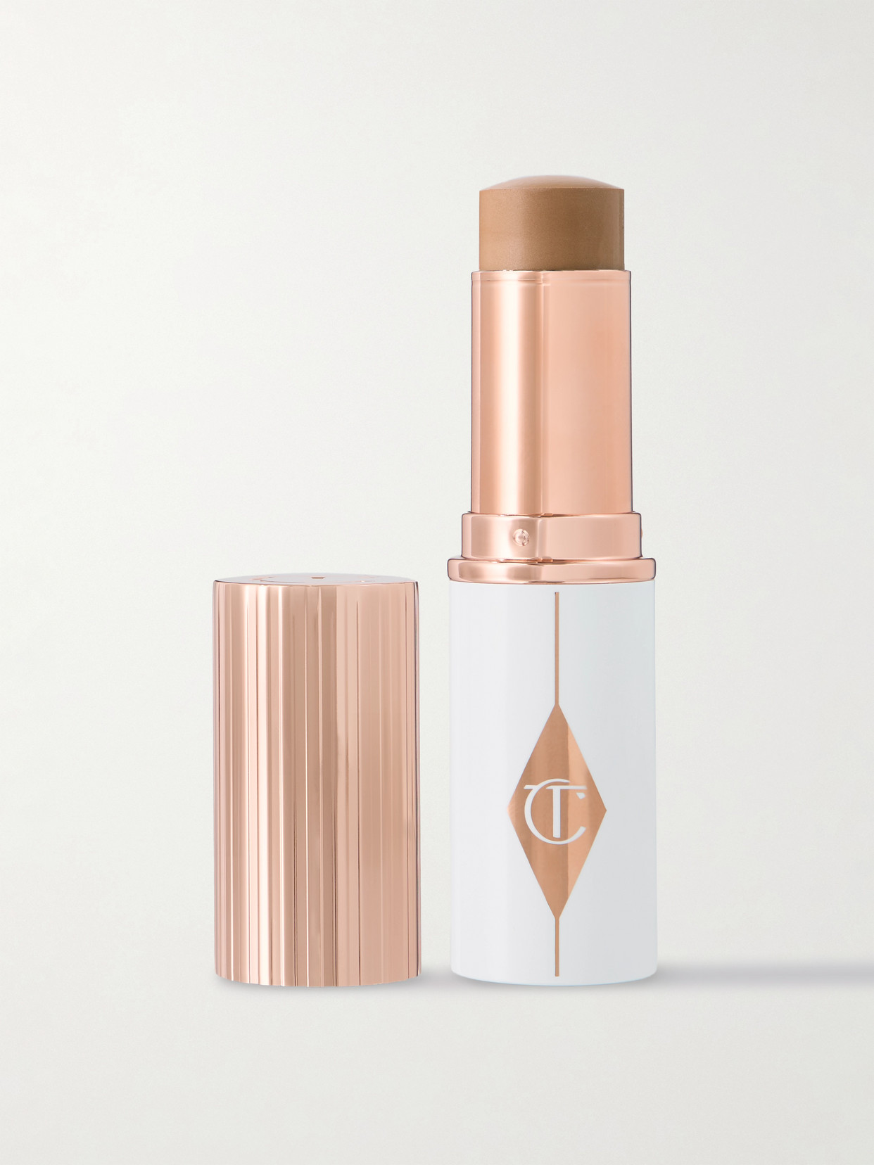 Charlotte Tilbury - Unreal Skin Sheer Glow Tint - 12 Tan, 9g