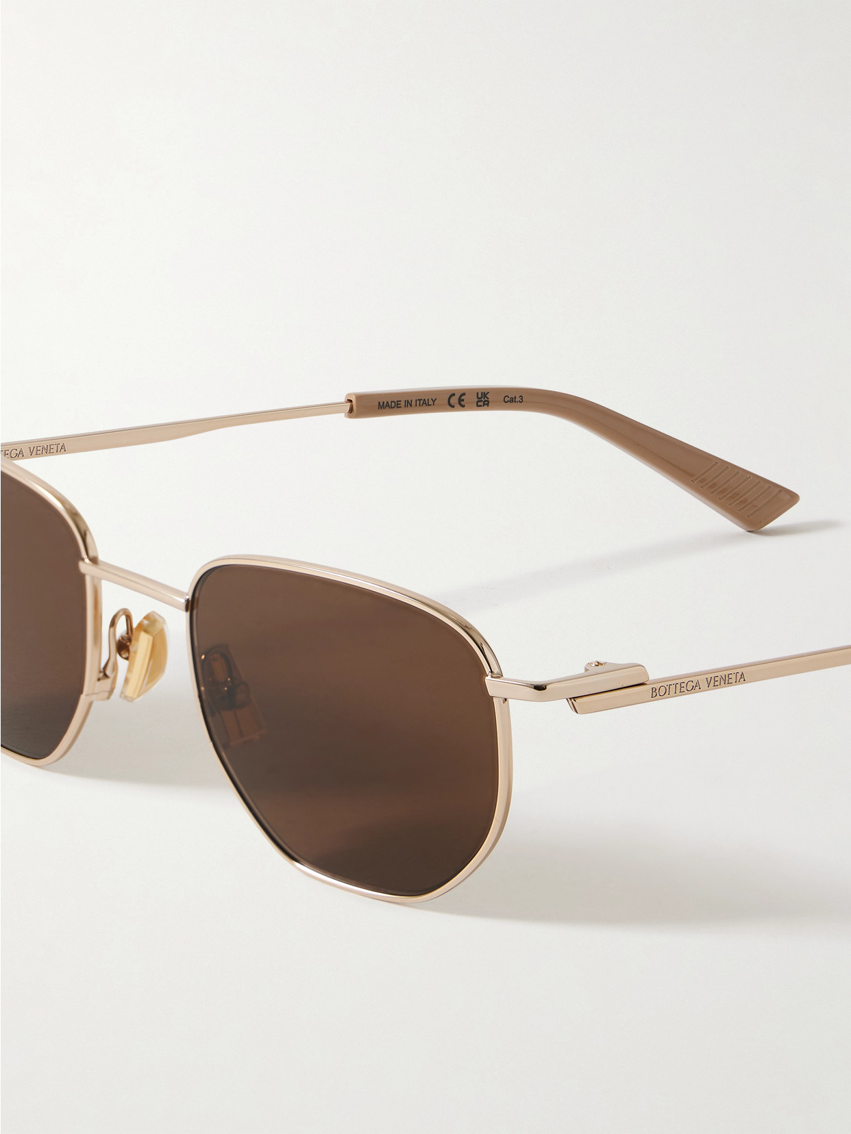 Shop Bottega Veneta Hexagon-frame Rose Gold-tone Sunglasses