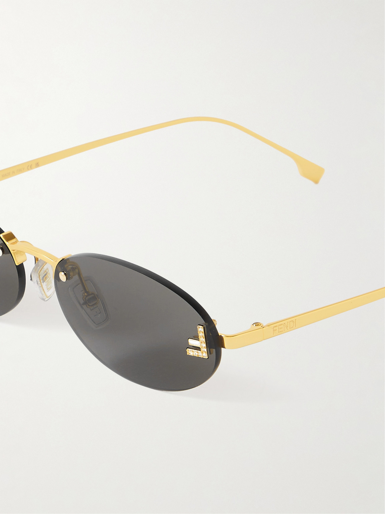 Shop Fendi Rimless Oval-frame Crystal-embellished Gold-tone Sunglasses