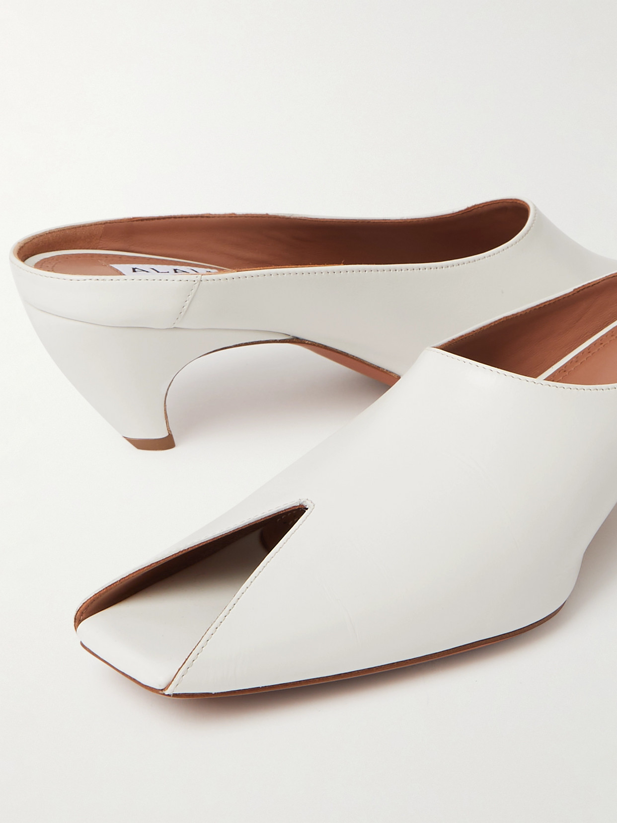 Alaïa Leather Peep-toe Kitten Mules In White