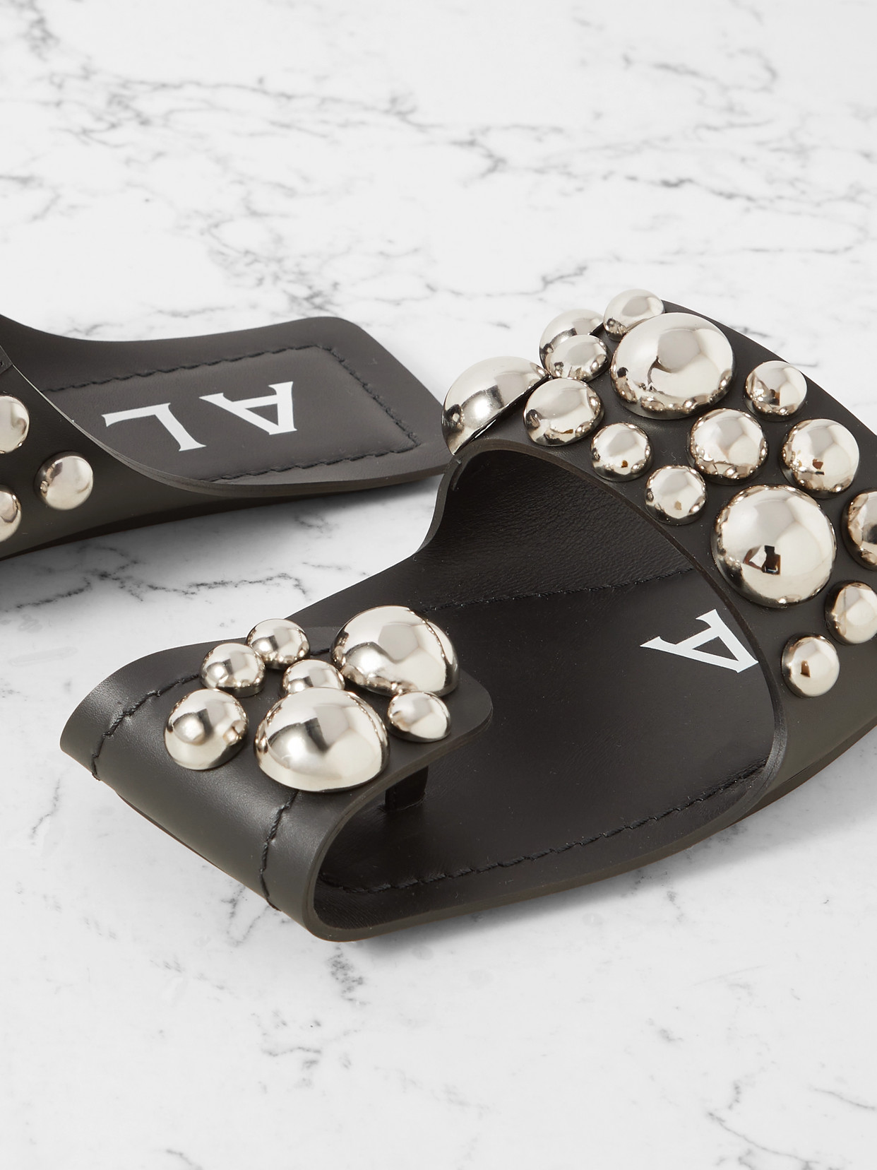 Alaïa Studded Leather Slides In Black