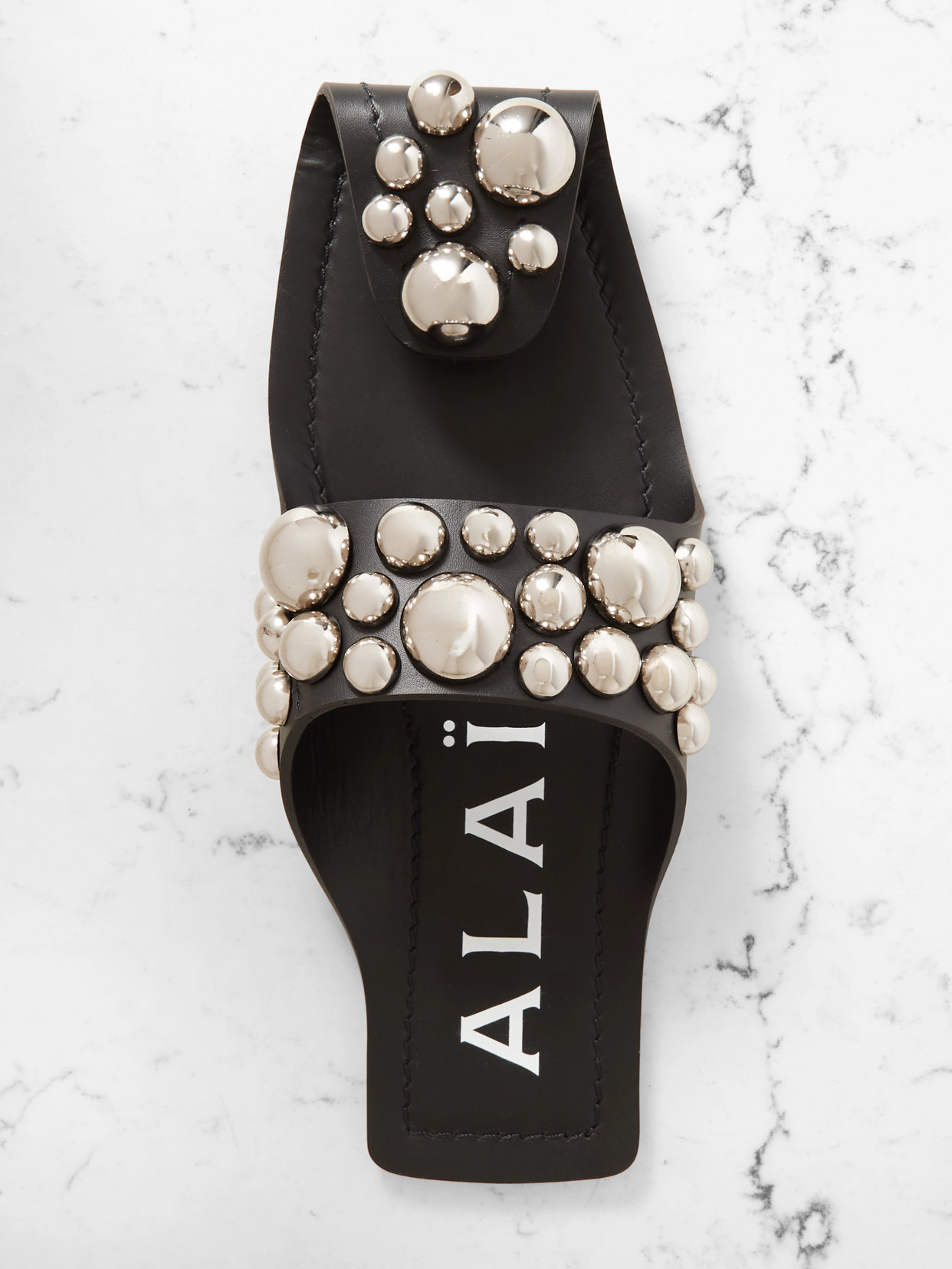 Alaïa Studded Leather Slides In Black