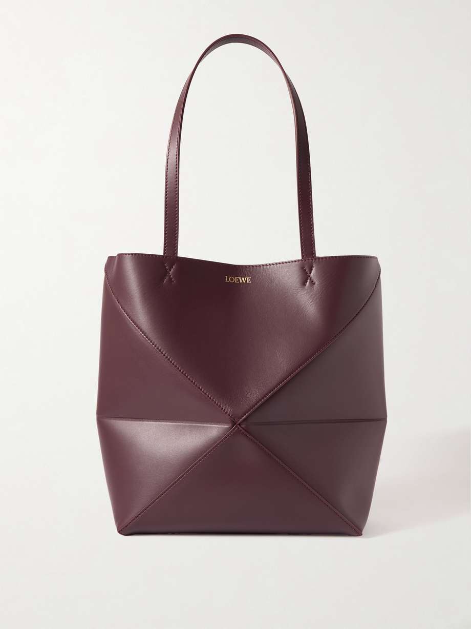 Bags have had a functional update this season - it's all about styles that can be converted so you can get maximum mileage. Loewe's medium 'Puzzle' tote has an origami-like construction that can be folded down when you're storing it or traveling. The leather is smooth and slouchy and the suede lining exquisitely soft.