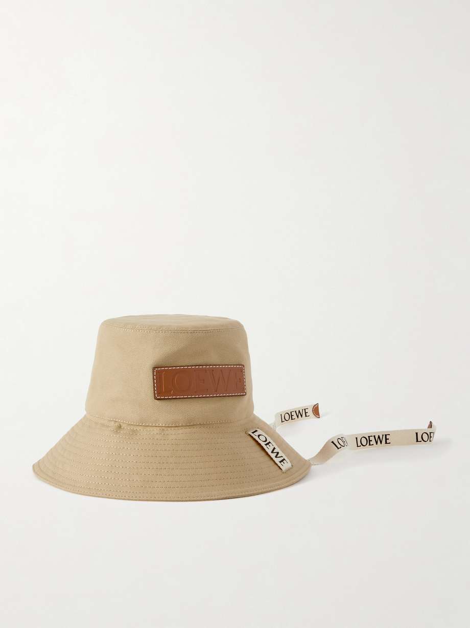 Loewe's latest collaboration with Paula's Ibiza is "oozing laid-back ease and a sense of spontaneity". Perfect for slipping on as you lounge around the pool or explore the town, this bucket hat is made from lightweight cotton-canvas and appliquéd with an embossed logo patch. Tie the webbing straps into a bow and let it hang down your back when the sun goes in.