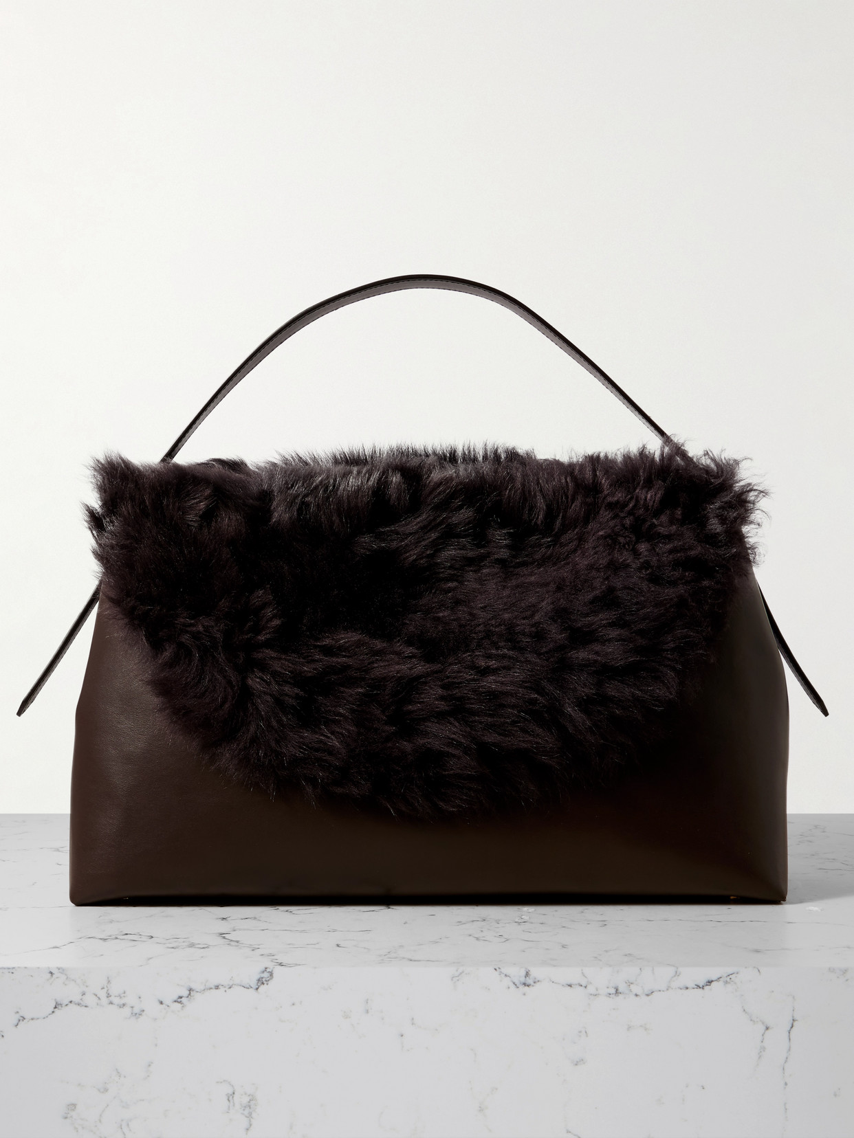 Totême T-lock Shearling Shoulder Bag In Brown
