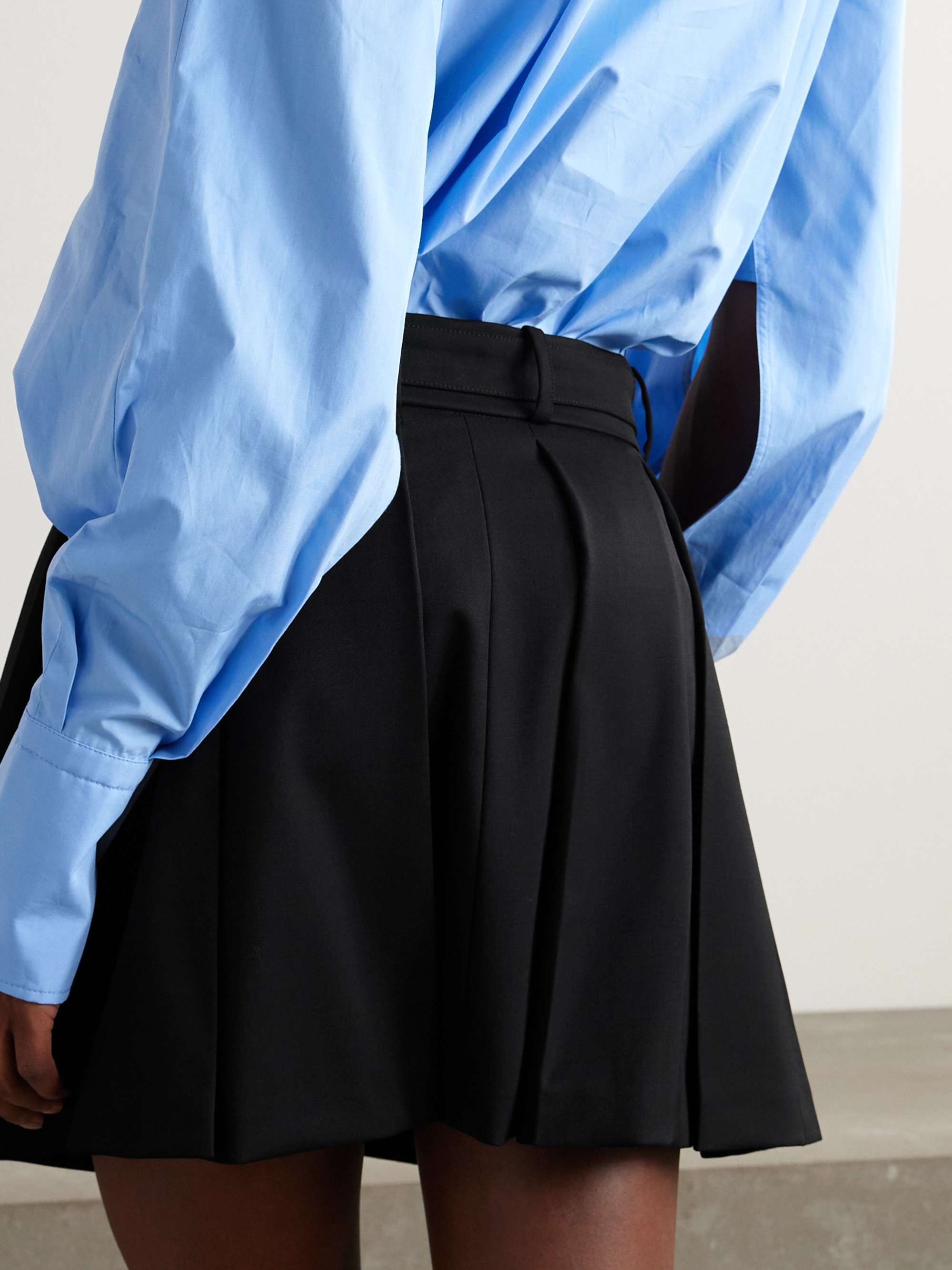PATOU Belted pleated stretch-wool twill mini skirt | NET-A