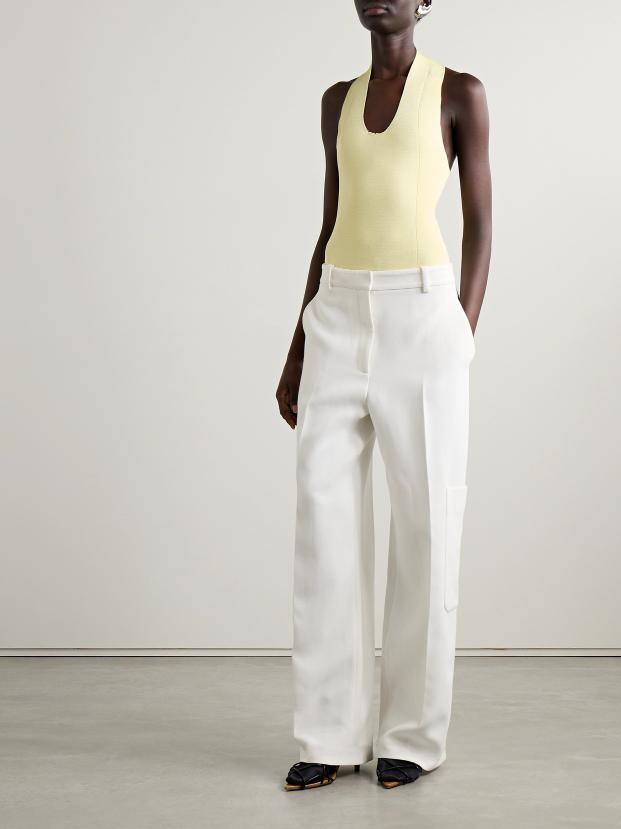 Khaite Toto Stretch-knit Halterneck Bodysuit In Yellow