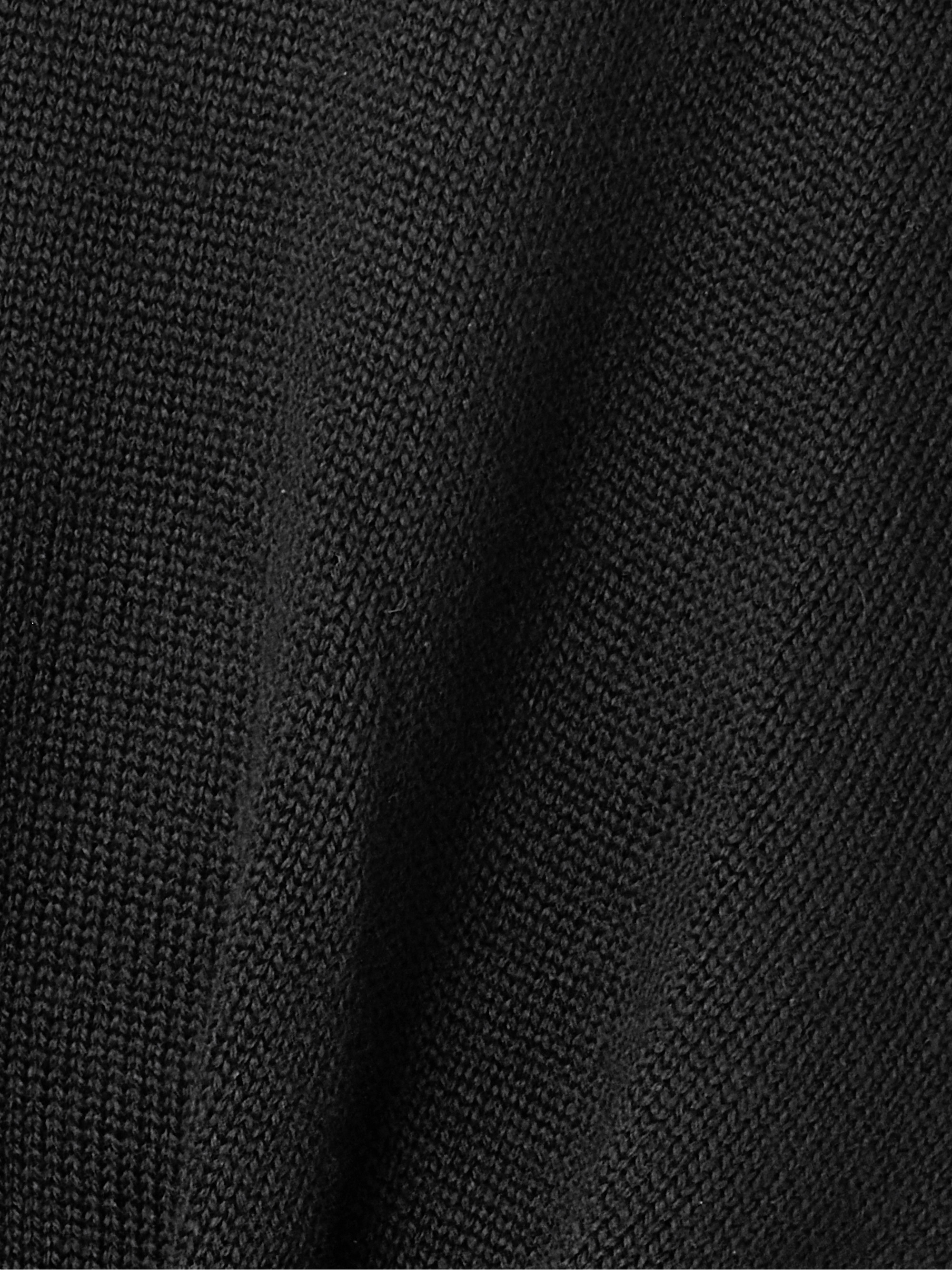 Alaïa Asymmetric wool turtleneck sweater