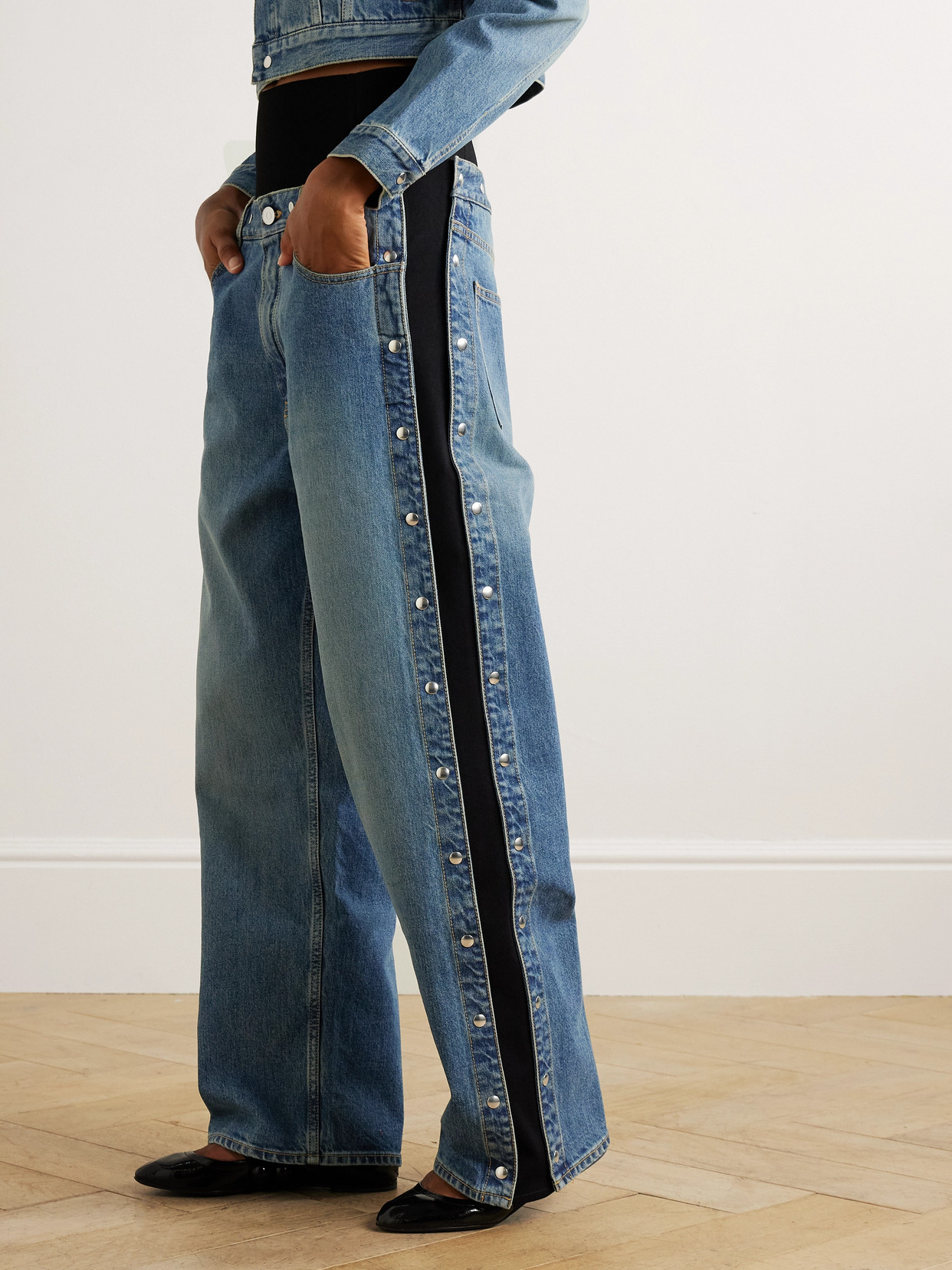 Alaïa Studded Jersey-trimmed High-rise Wide-leg Jeans In Blue