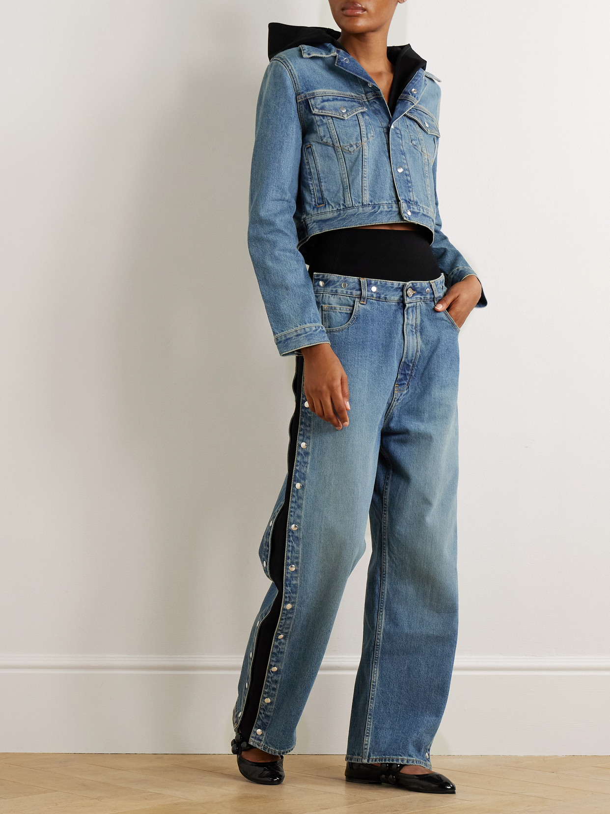 Alaïa Studded Jersey-trimmed High-rise Wide-leg Jeans In Blue