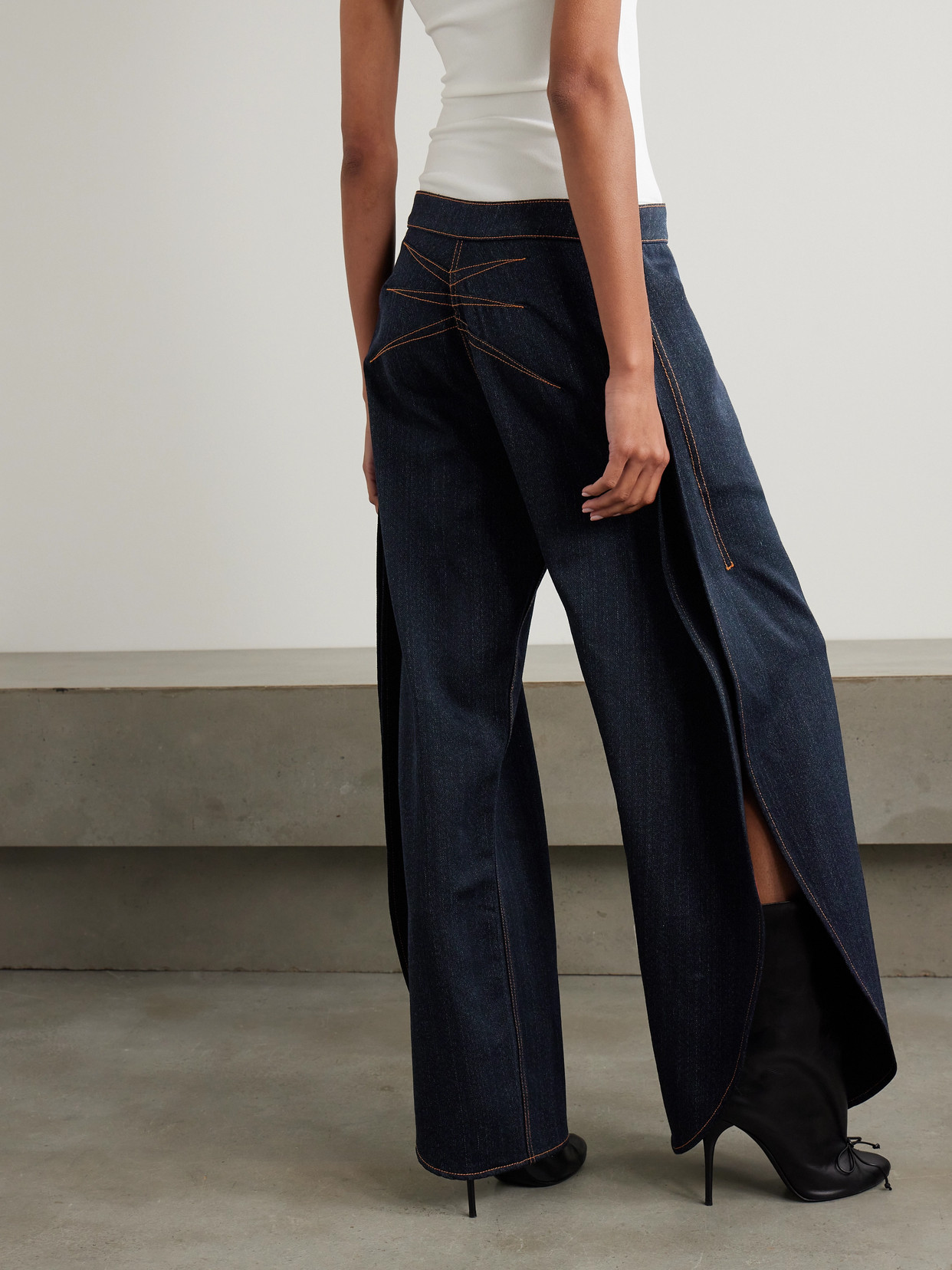 Shop Alaïa Layered Low-rise Wide-leg Jeans In Blue