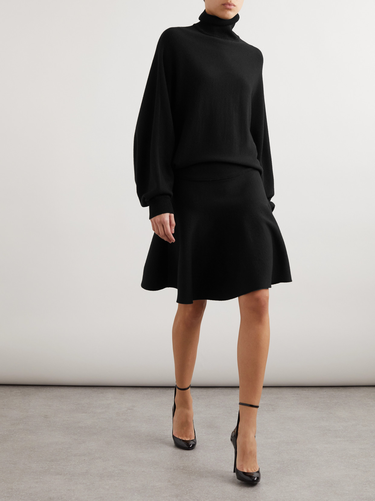 ALAÏA PLEATED VIRGIN WOOL AND WOOL-BLEND TURTLENECK MINI DRESS