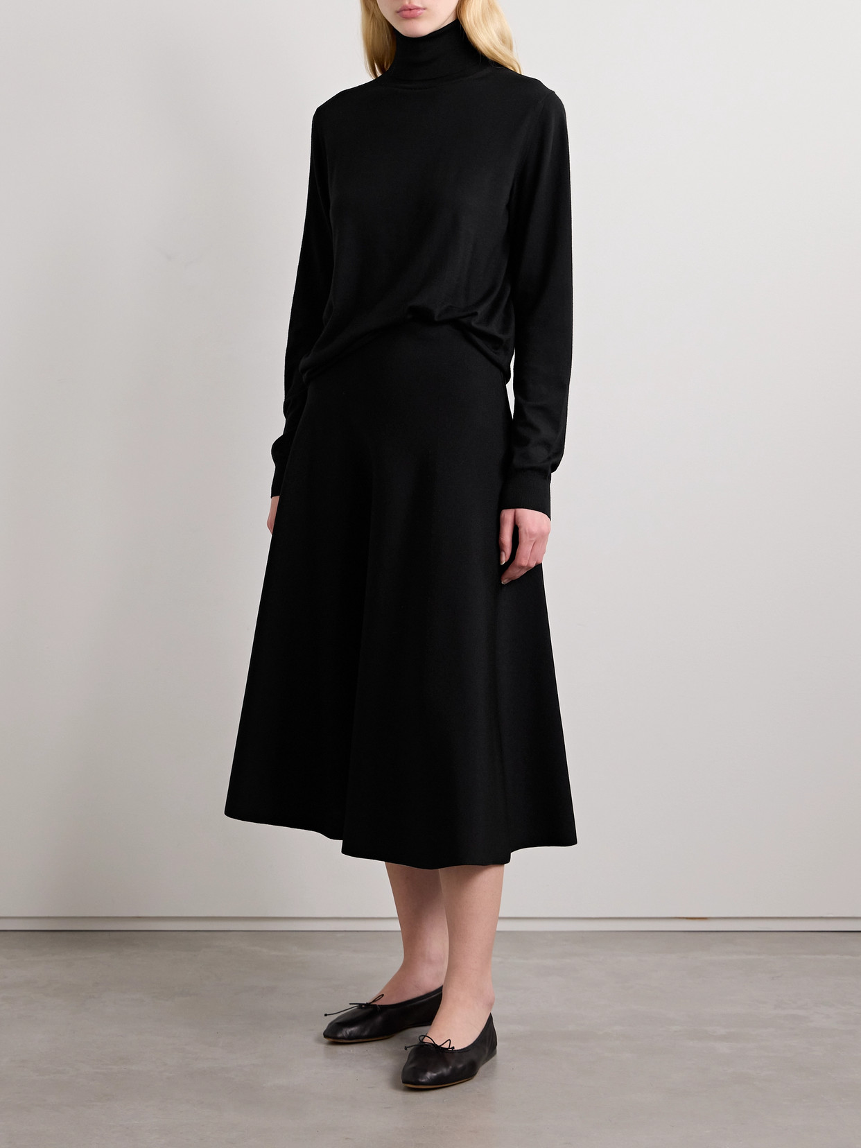 The Row Heva Wool-jersey Turtleneck Sweater In Black