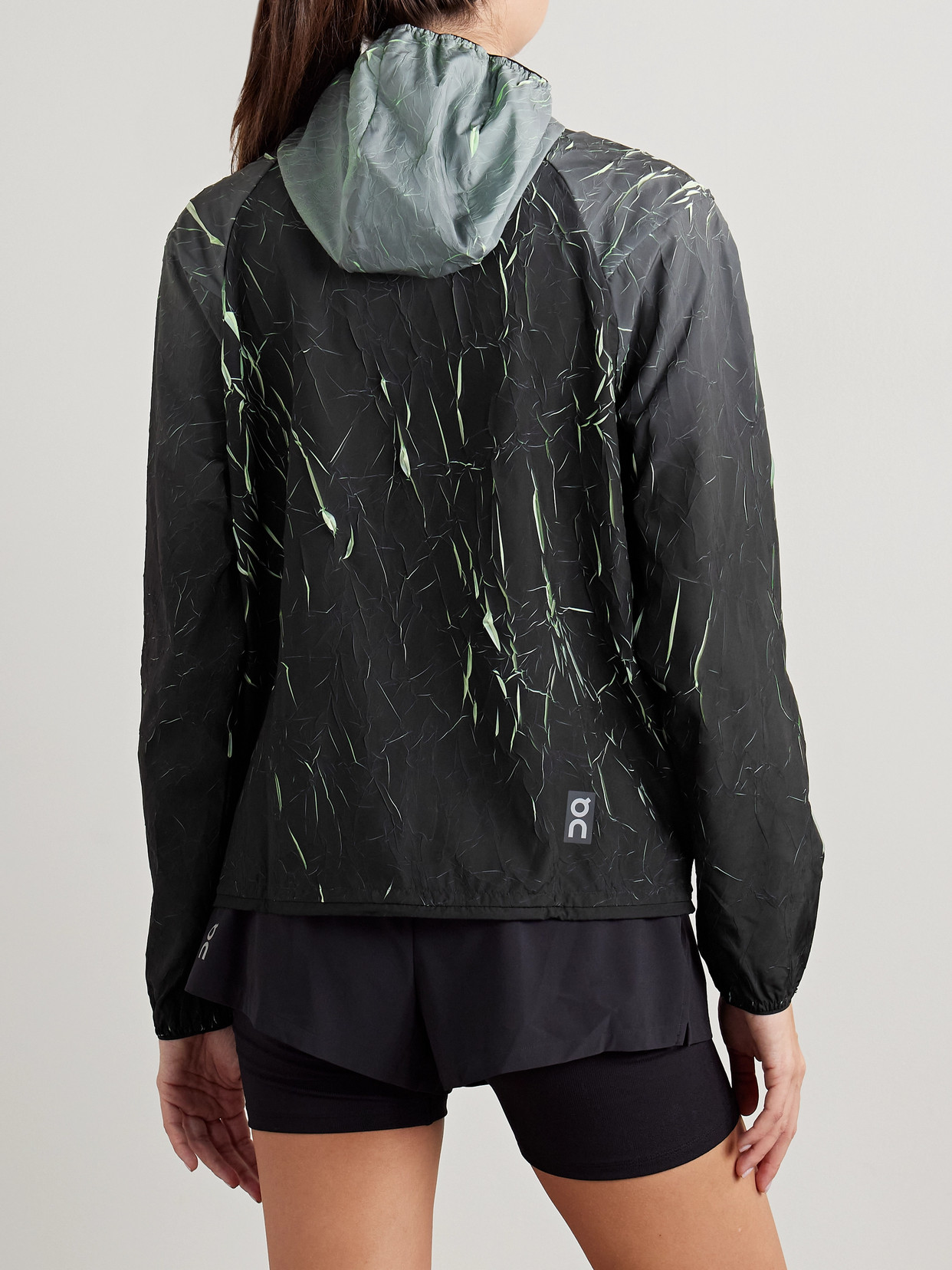 On Pace Run Hooded Textured Recycled-shell Jacket In Black