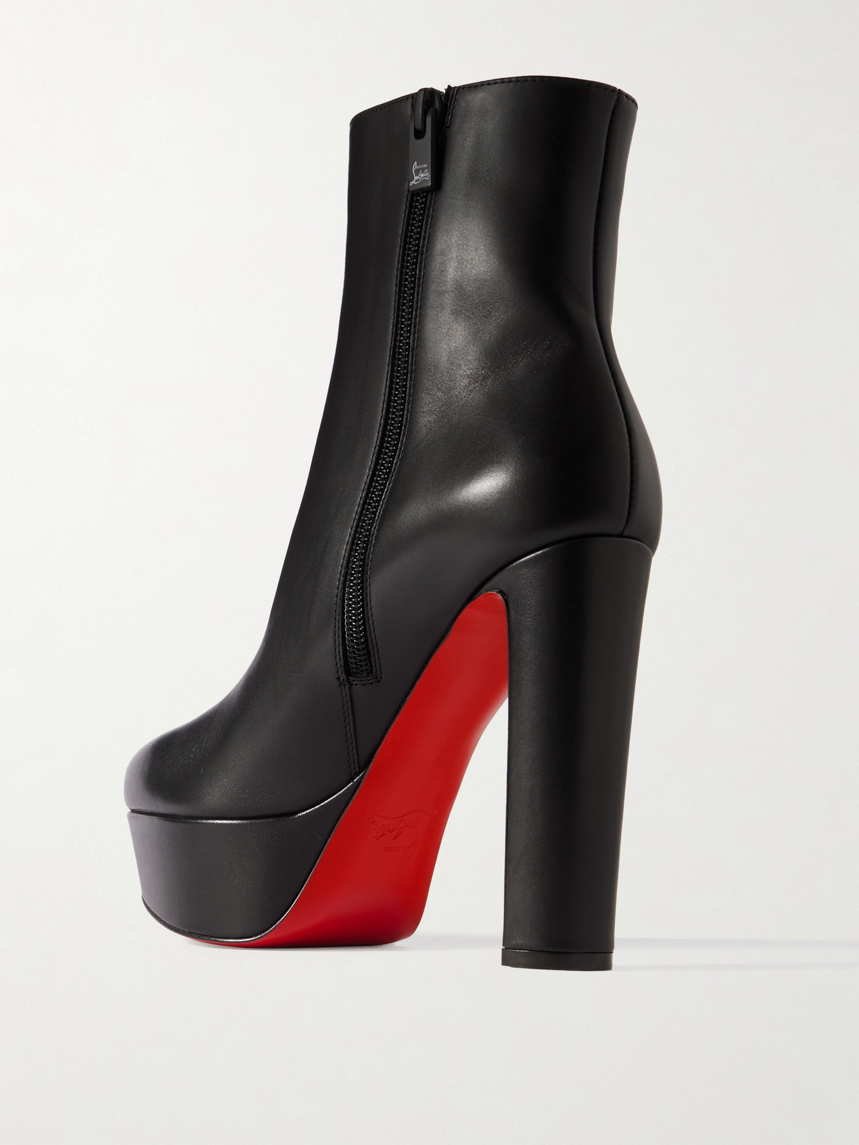 Shop Christian Louboutin Movida 130 Leather Platform Ankle Boots In Black