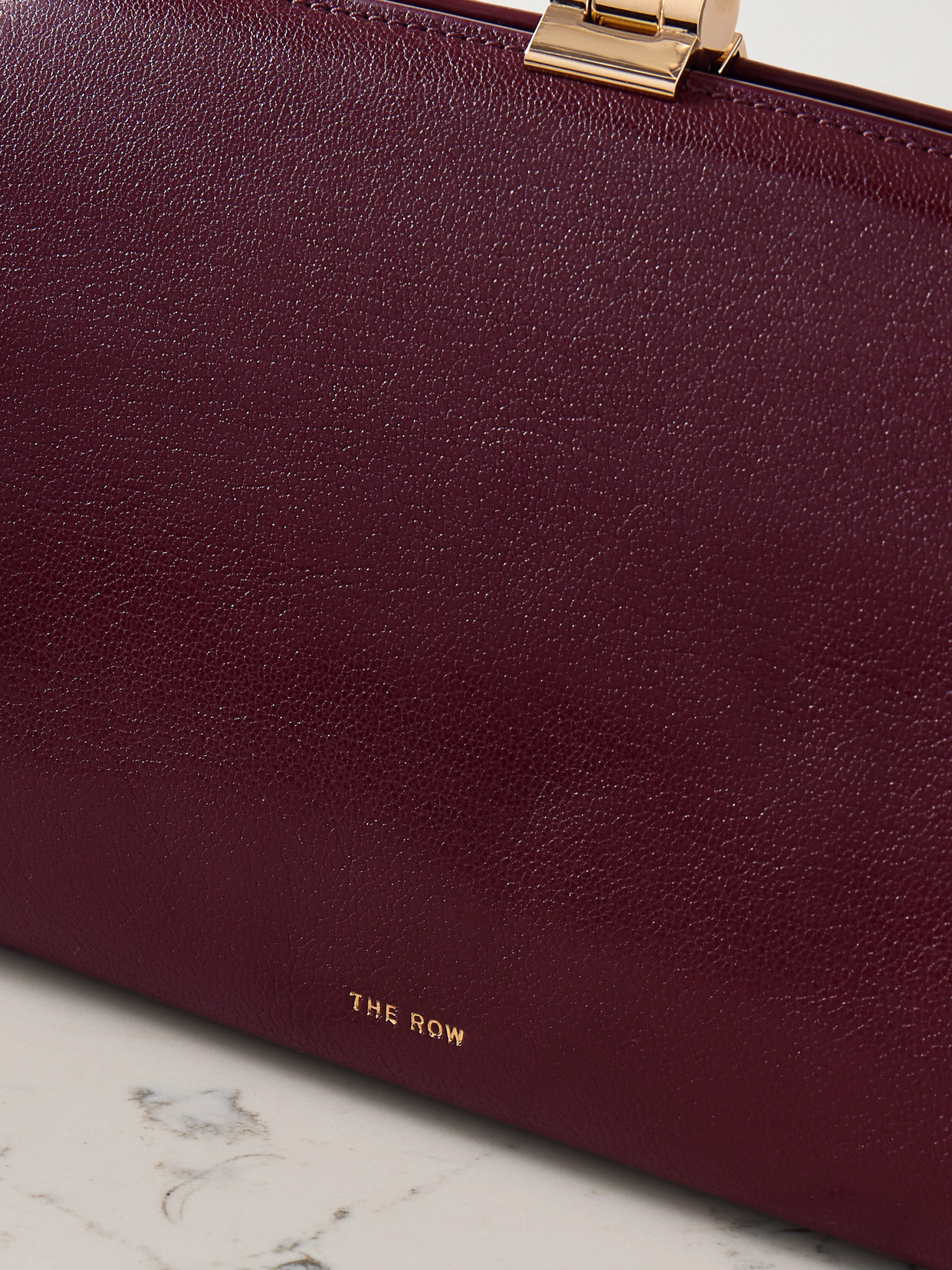 The Row Amazon Textured-leather Clutch In Burgundy