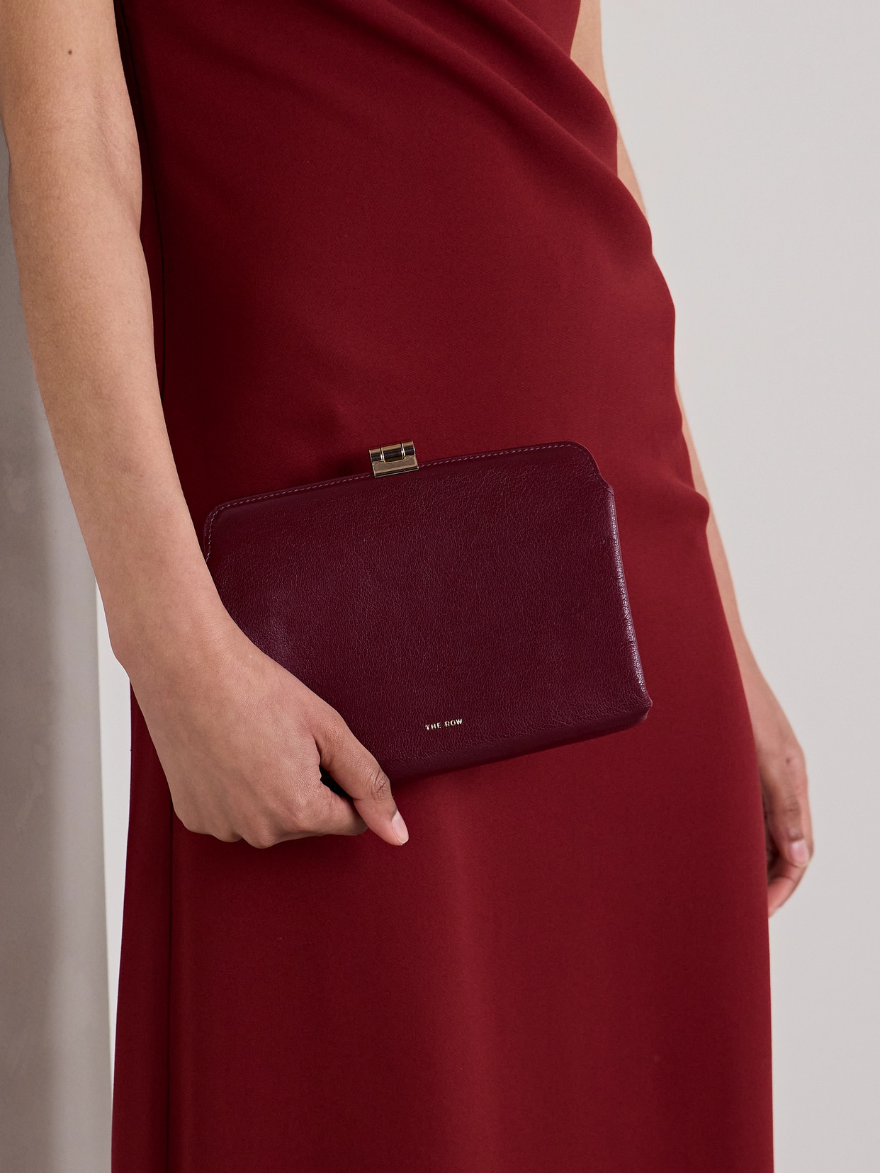 The Row Amazon Textured-leather Clutch In Burgundy