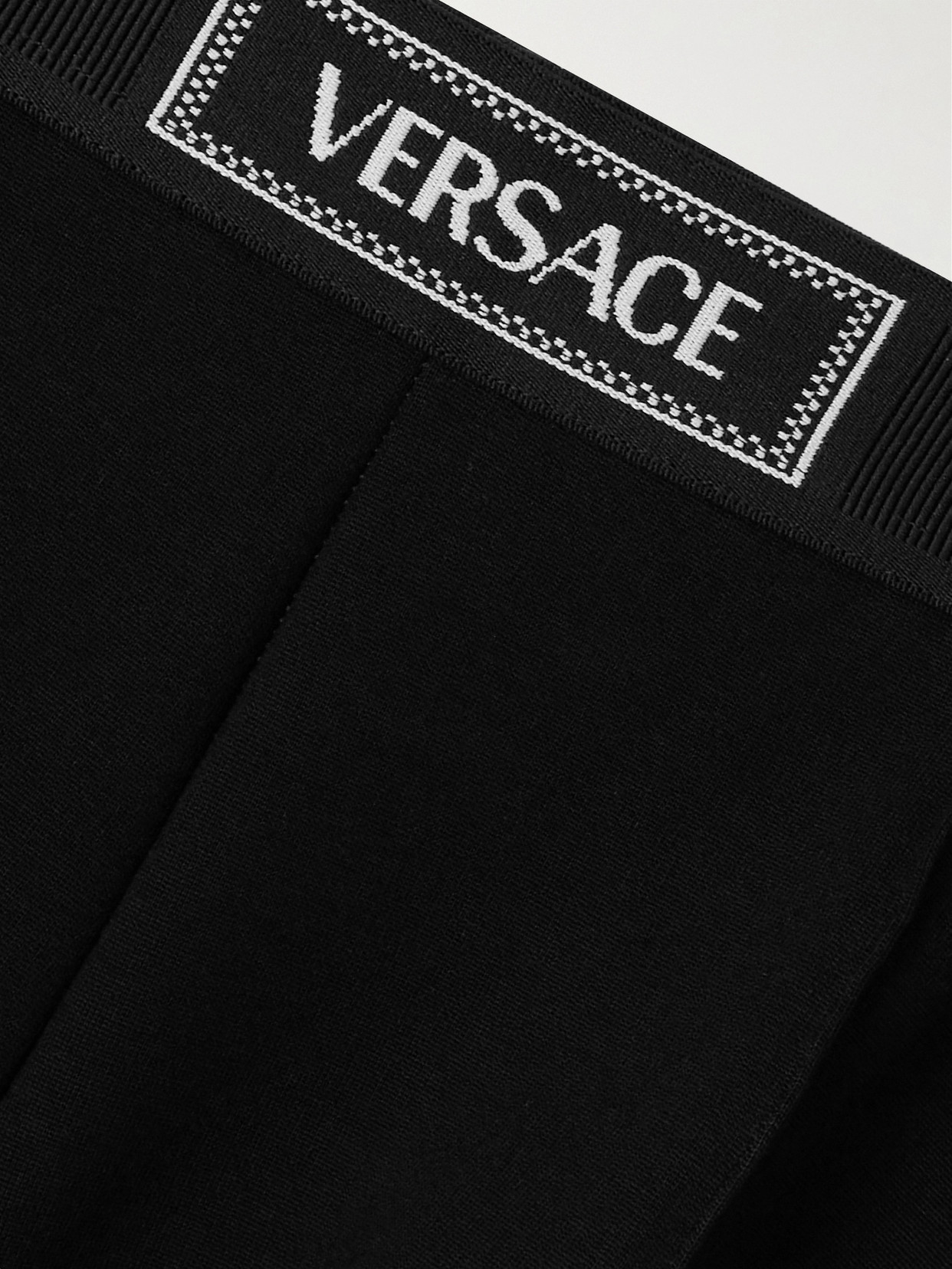 Versace Stretch-jersey Stirrup Leggings In Black