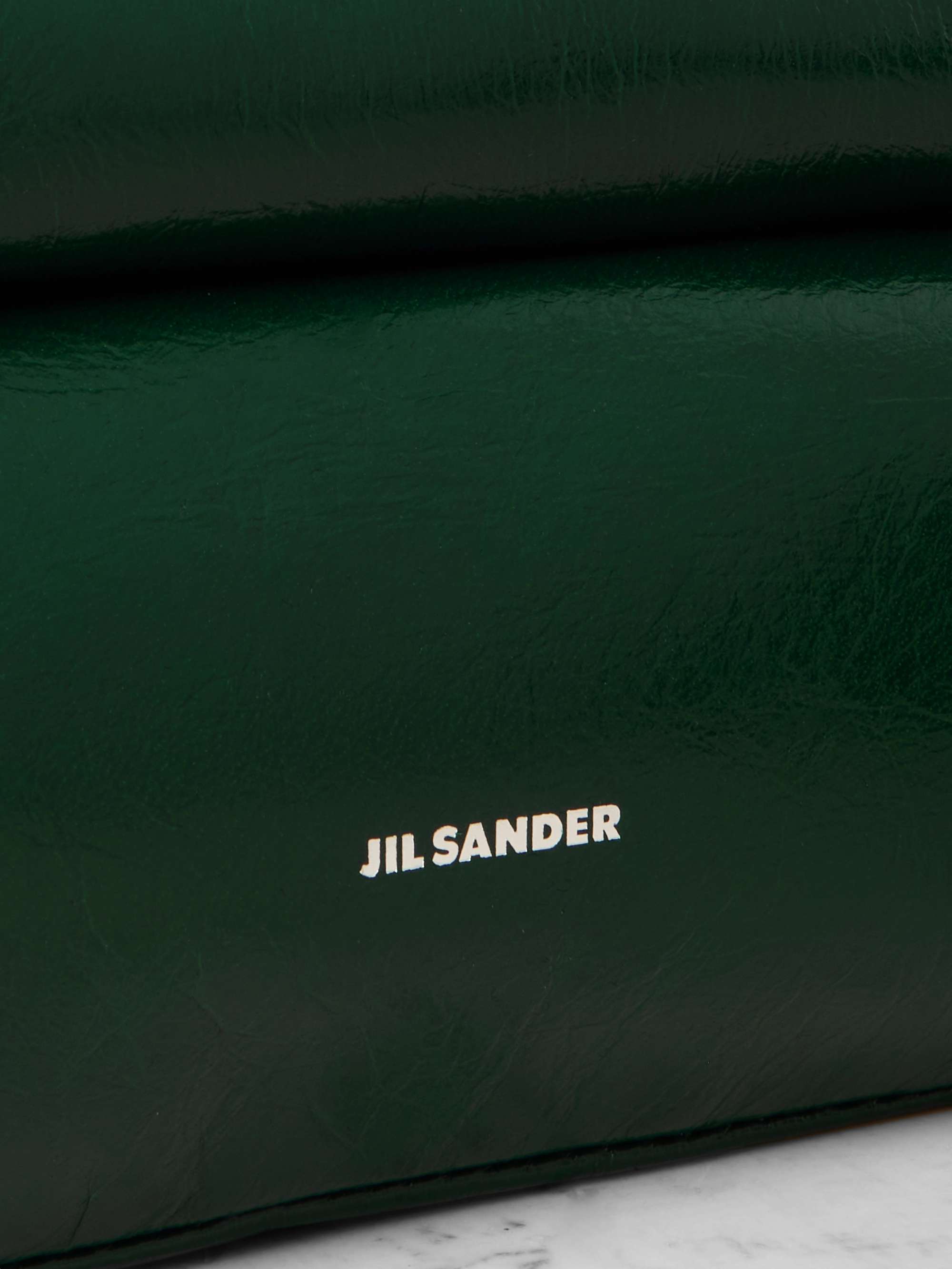 JIL SANDER Rollup small glossed crinkledleather shoulder bag NETA