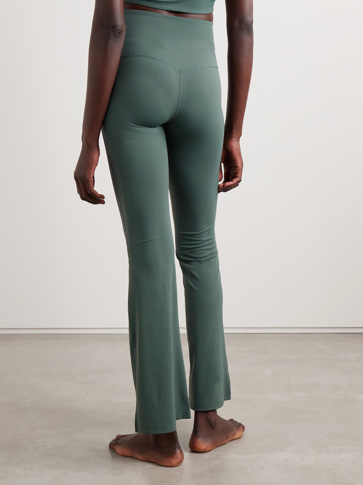 Nike Zenvy Stretch-jersey Flared Leggings In Green