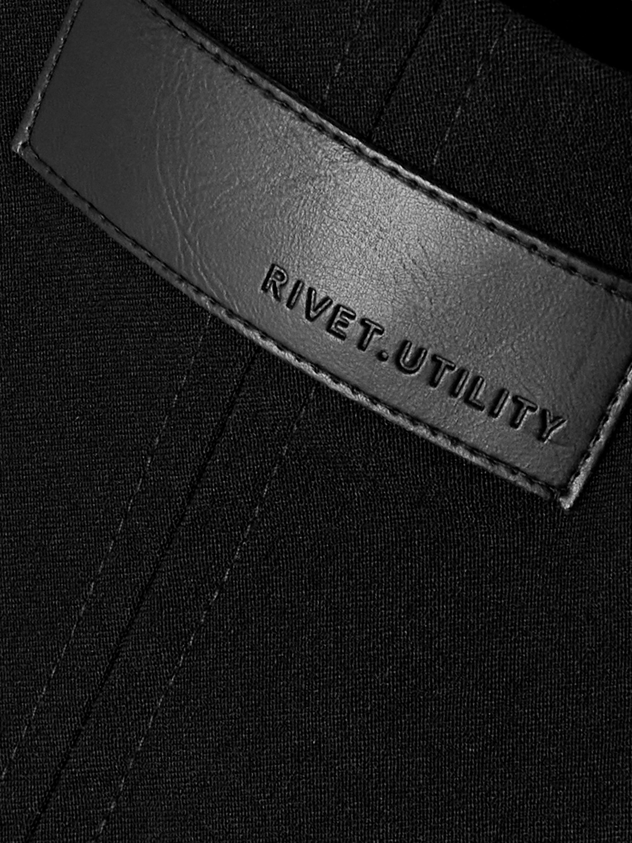 Rivet Utility Dynamite Strapless Stretch-twill Jumpsuit In Black