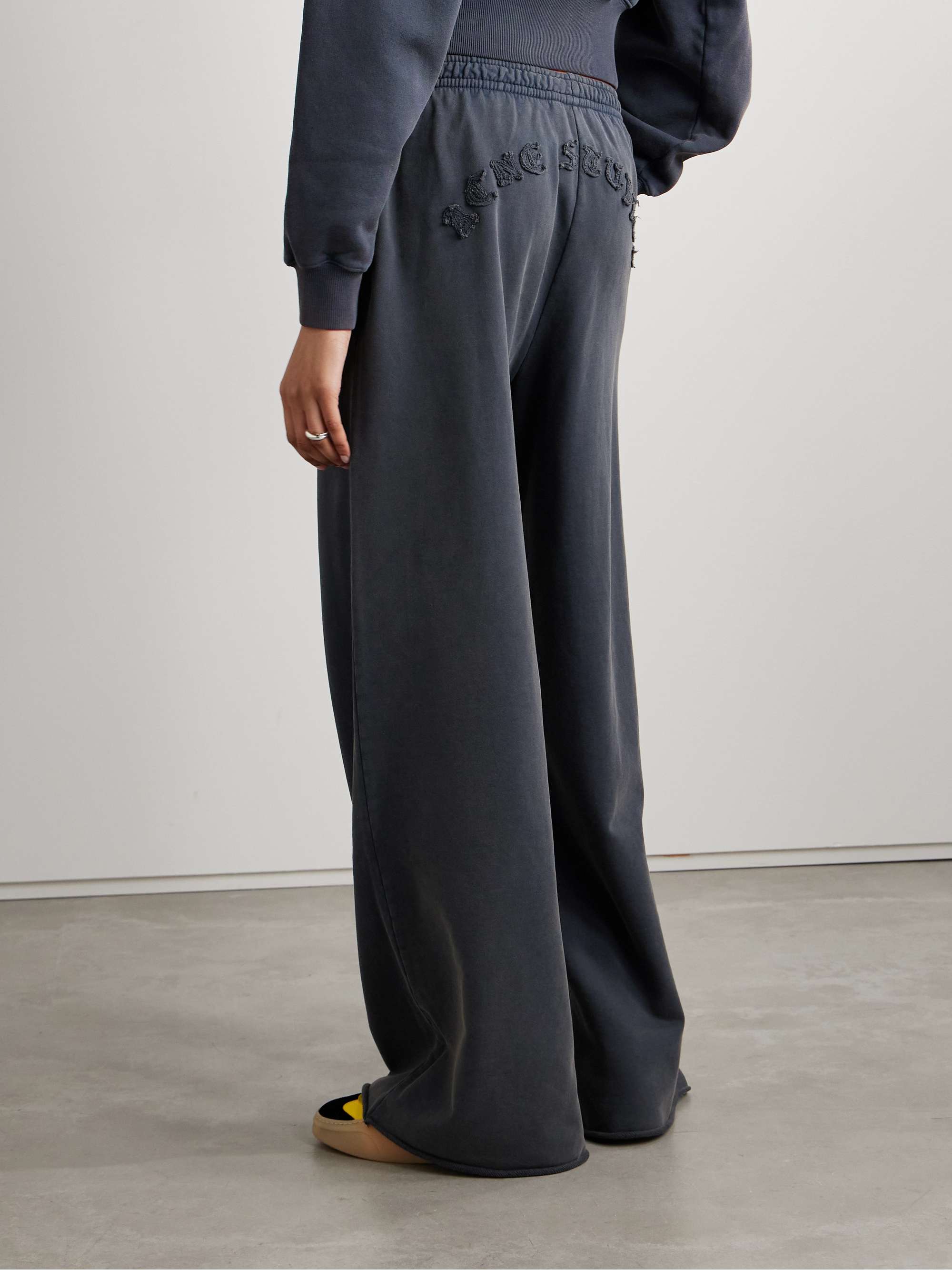 ACNE STUDIOS Appliquéd cotton-jersey wide-leg track pants ACNE STUDIOS Appliquéd cotton-jersey wide-leg track pants