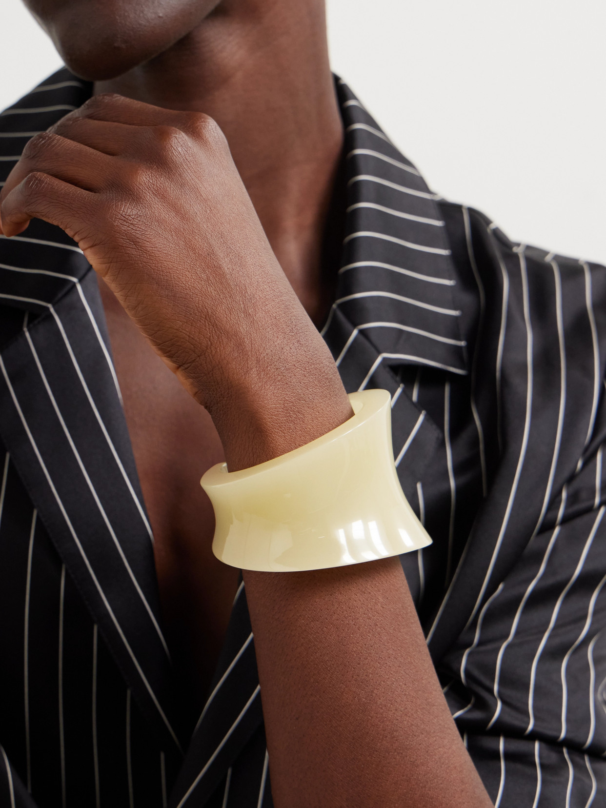 Saint Laurent Asymmetric Resin Cuff In Ivory