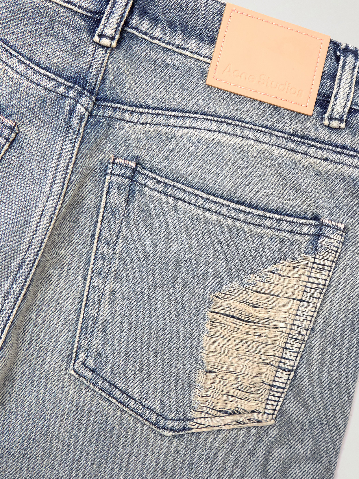 Acne Studios Distressed Mid-rise Flared Jeans In Blue