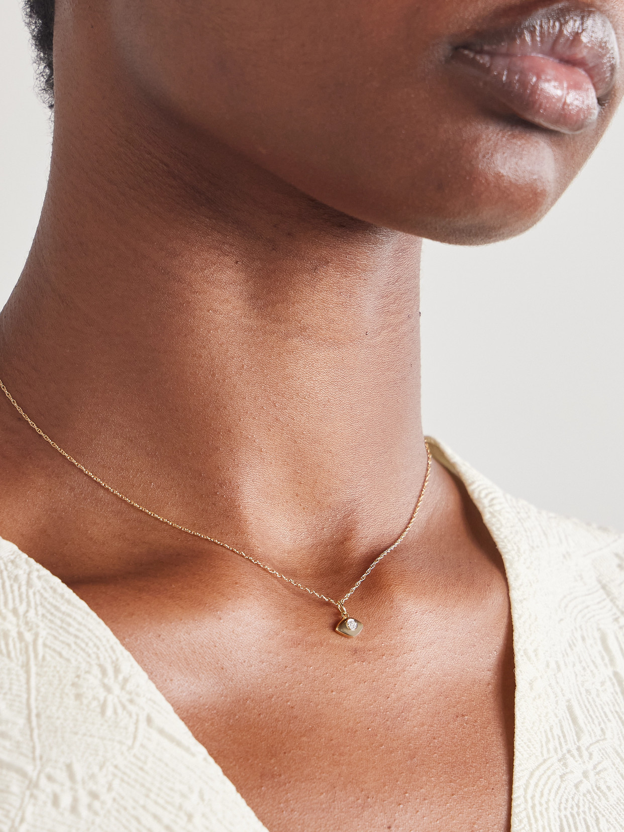 Shop Stone And Strand Tiny Evil Eye 10-karat Gold Diamond Necklace