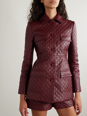 Gucci Paneled debossed leather jacket