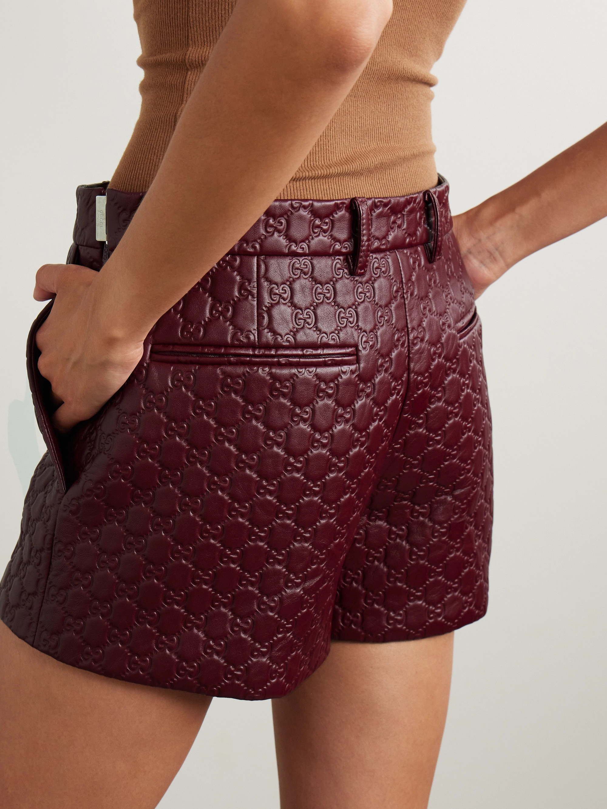 Gucci Logo-debossed leather shorts