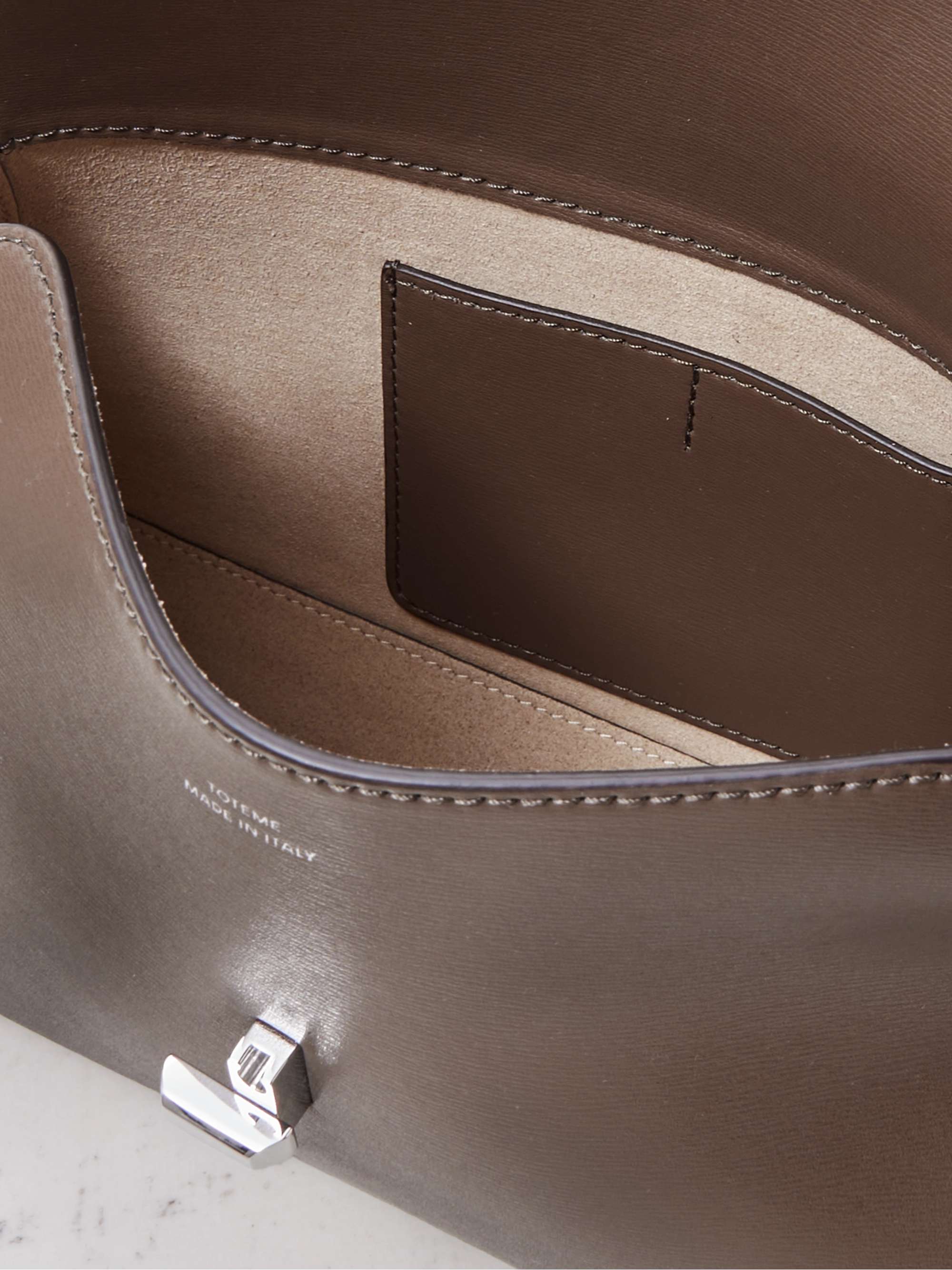 TOTEME T-Lock leather clutch
