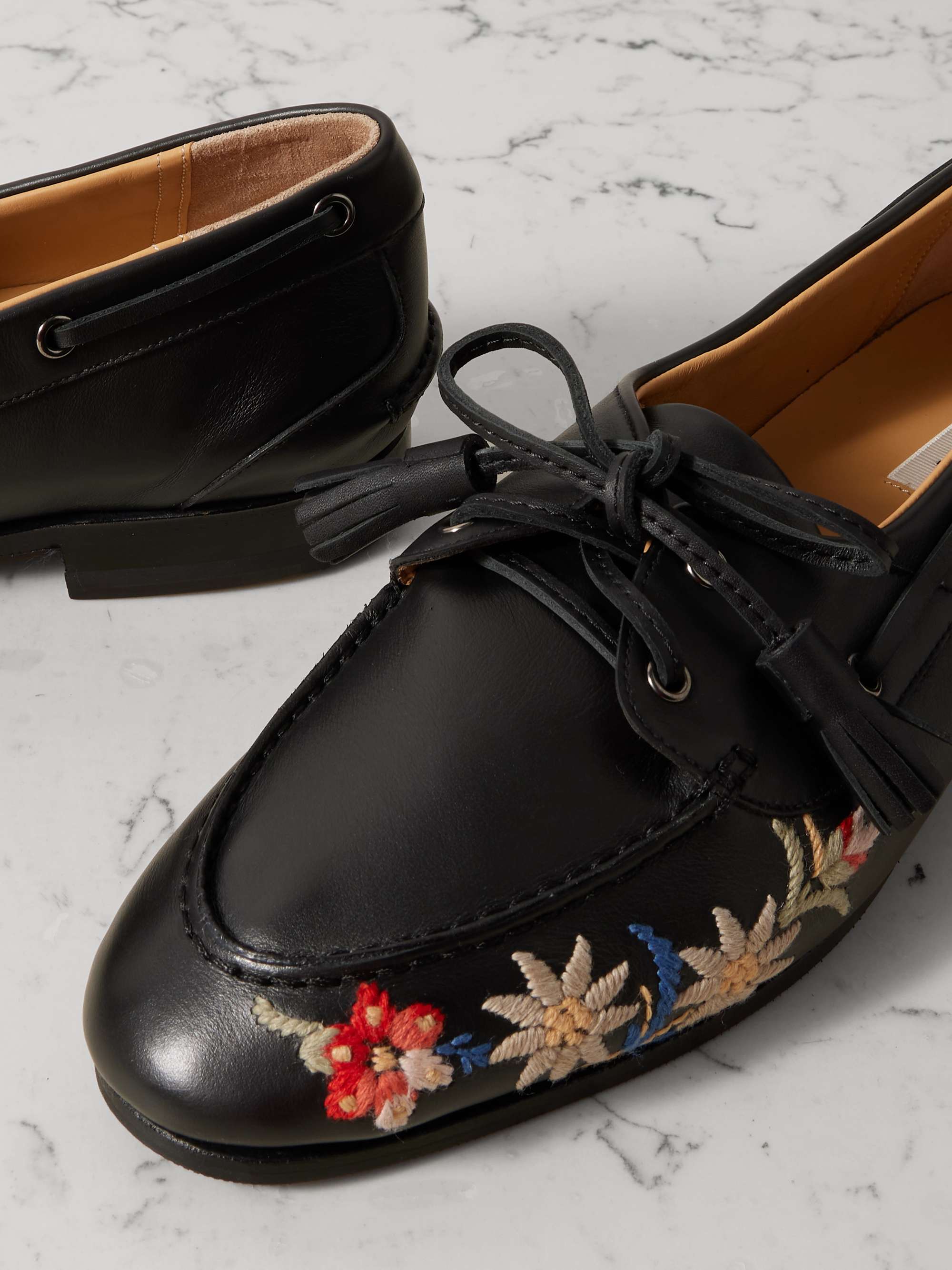 Black Pathy embroidered tasseled leather loafers | BALLY