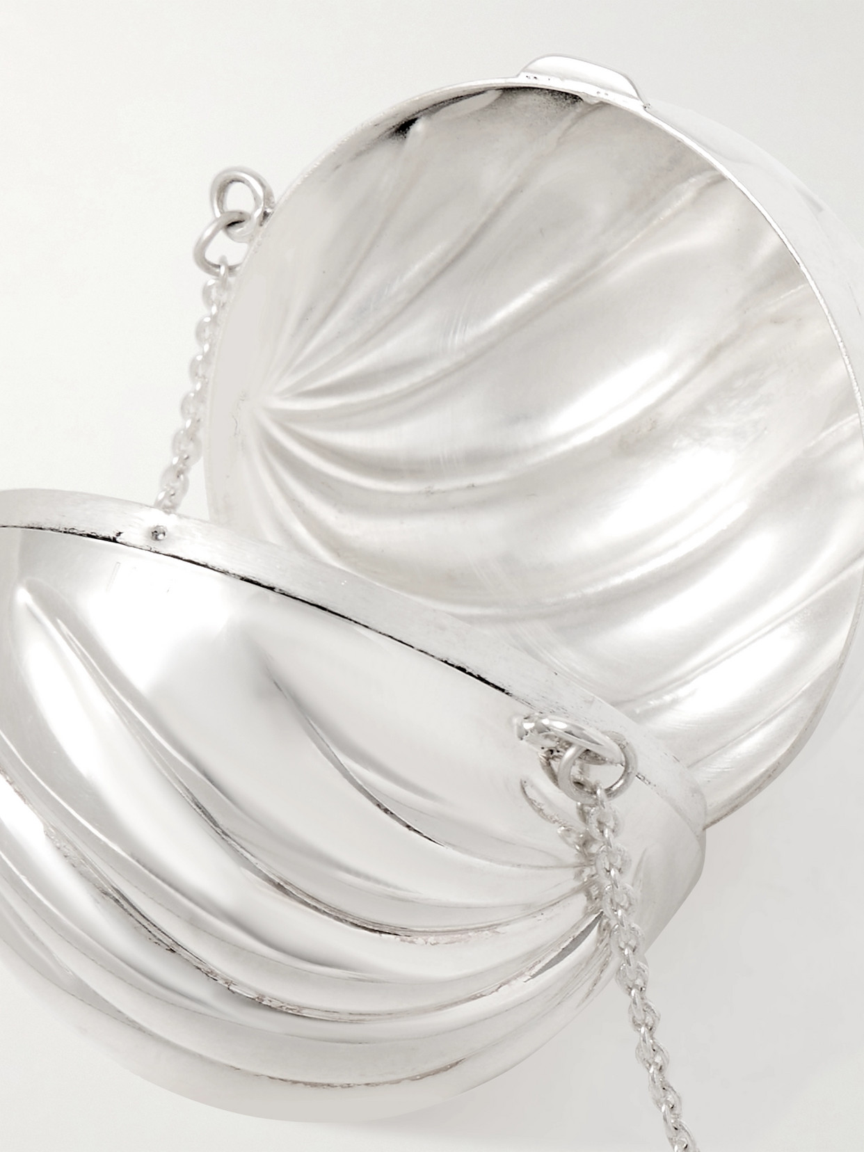 Uncommon Matters Whirl Silver Clutch In Silver