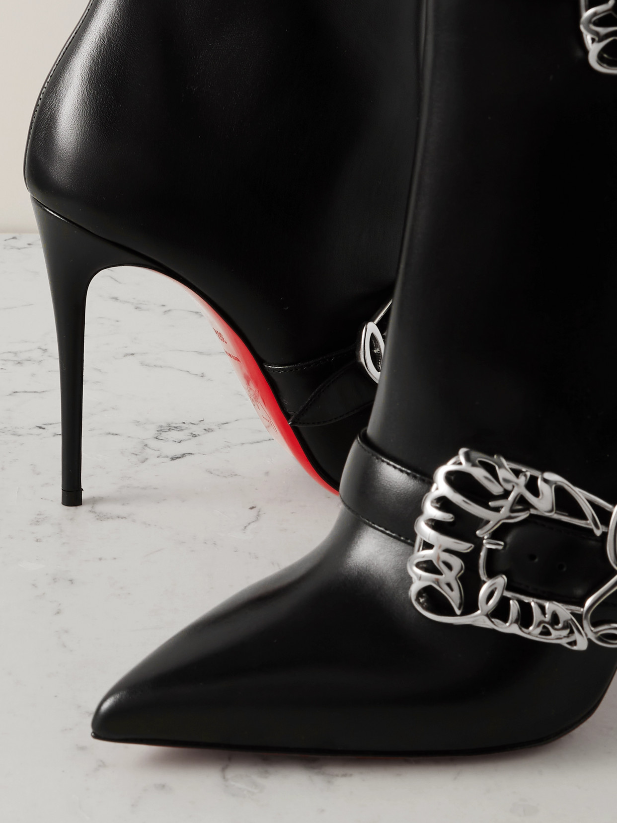 Christian Louboutin Giddylina Logo Buckle Pointed Toe Bootie In Black