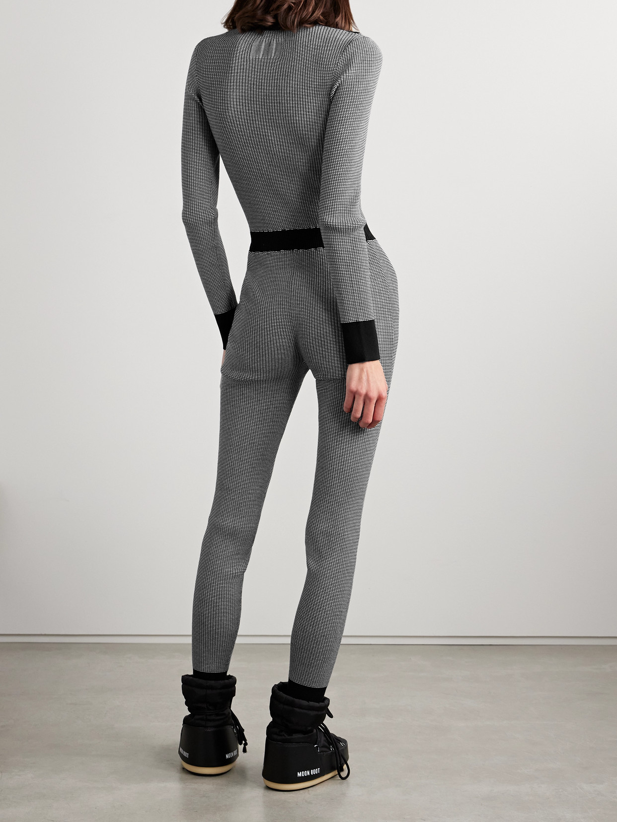 Guest In Residence Speed Skate Ribbed Striped Merino Wool-blend Jumpsuit In Black