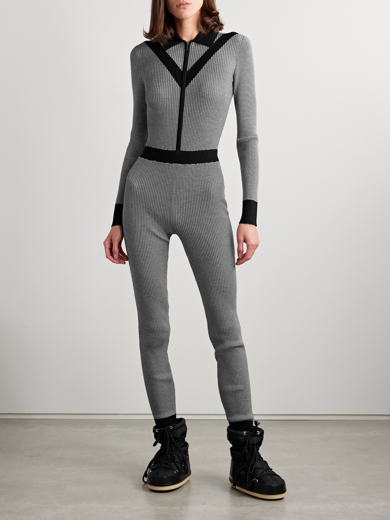 Guest In Residence Speed Skate Ribbed Striped Merino Wool-blend Jumpsuit In Black